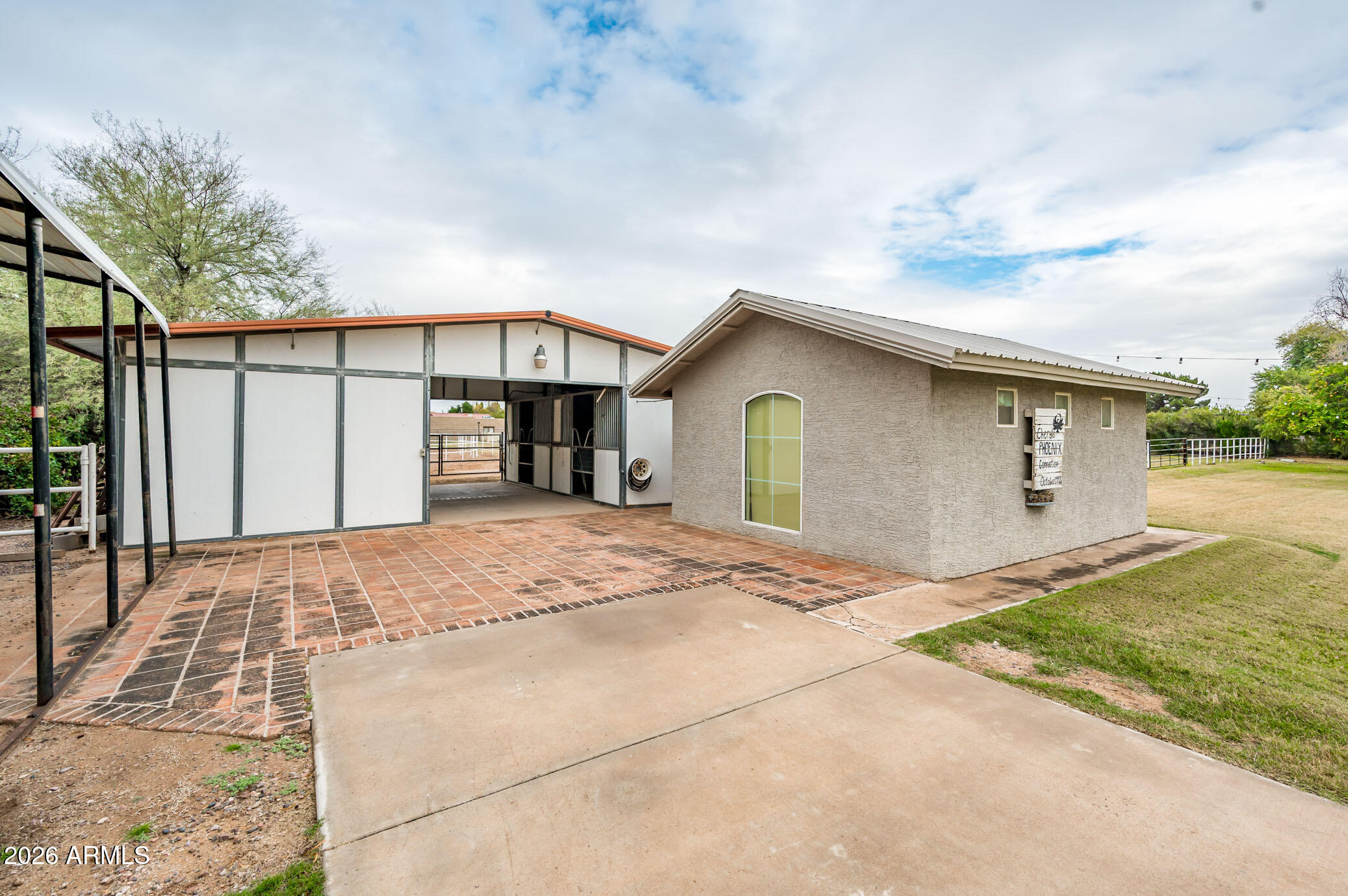 4730 West Piedmont Road Laveen, AZ 85339 - Photo 31 of 65 a front view of a house with a yard and garage