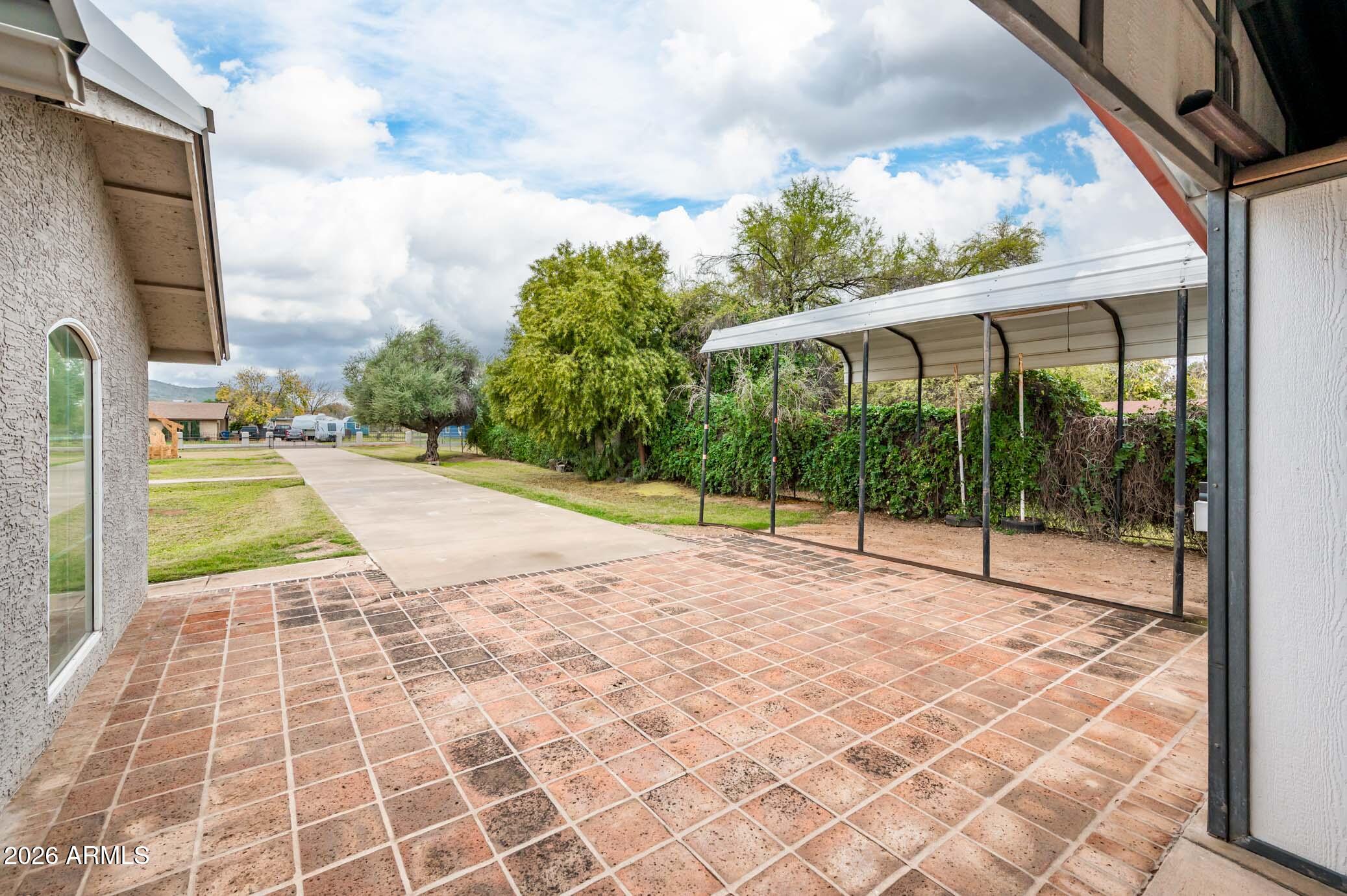 4730 West Piedmont Road Laveen, AZ 85339 - Photo 35 of 65 a view of a backyard with garden