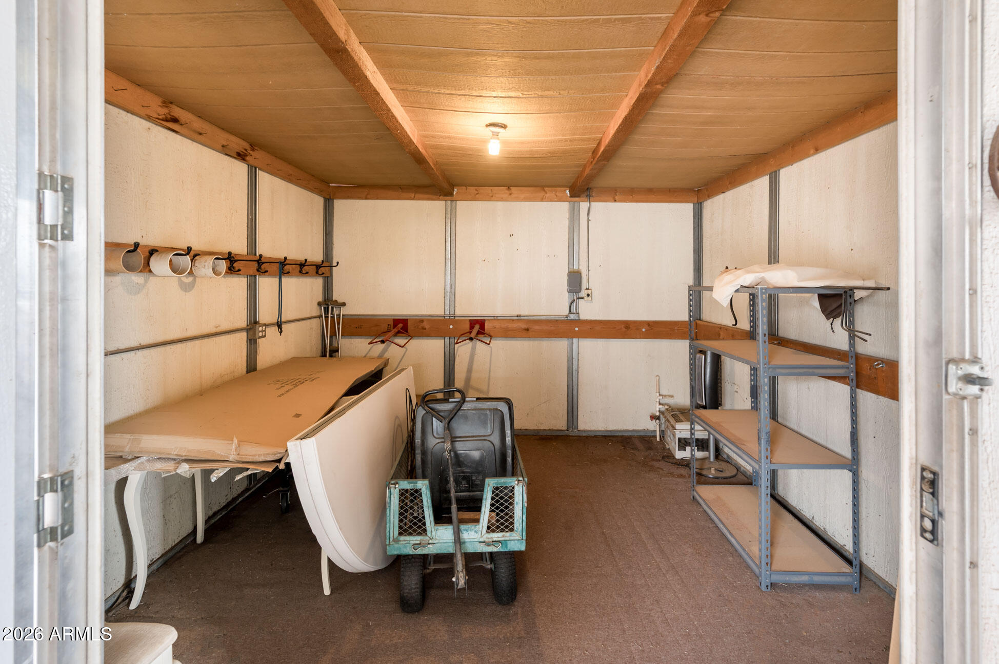 4730 West Piedmont Road Laveen, AZ 85339 - Photo 41 of 65 a room with gym equipment and a large window