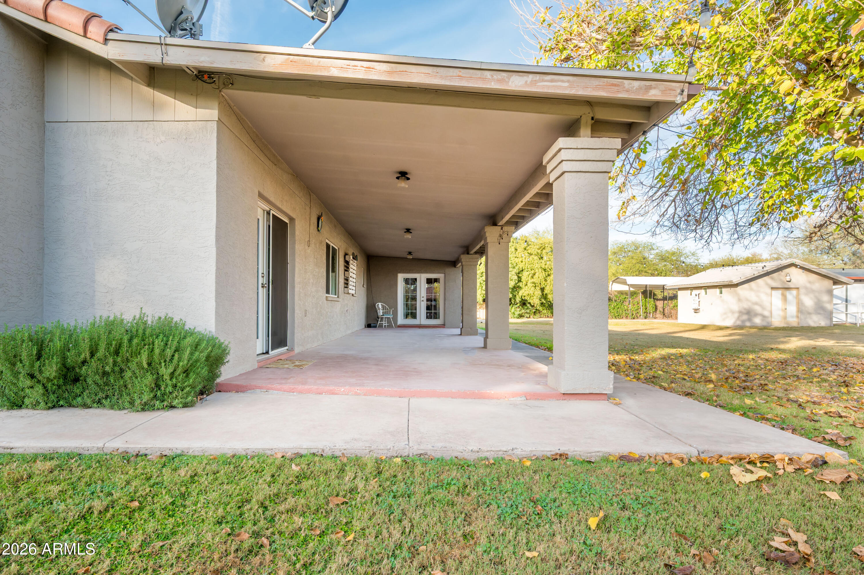 4730 West Piedmont Road Laveen, AZ 85339 - Photo 55 of 65 a view of a house with backyard and a tree