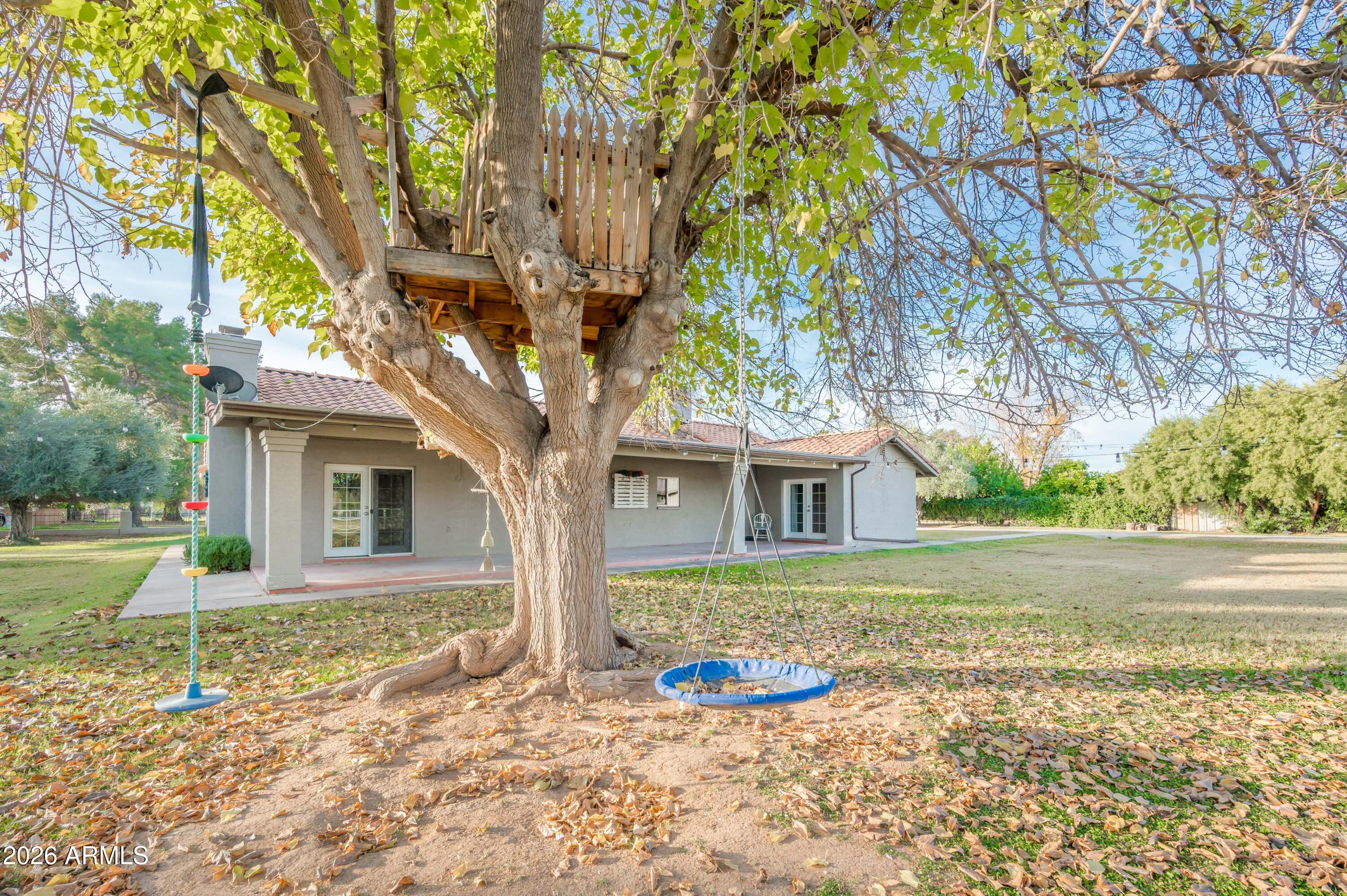 4730 West Piedmont Road Laveen, AZ 85339 - Photo 56 of 65 a front view of a house with a yard