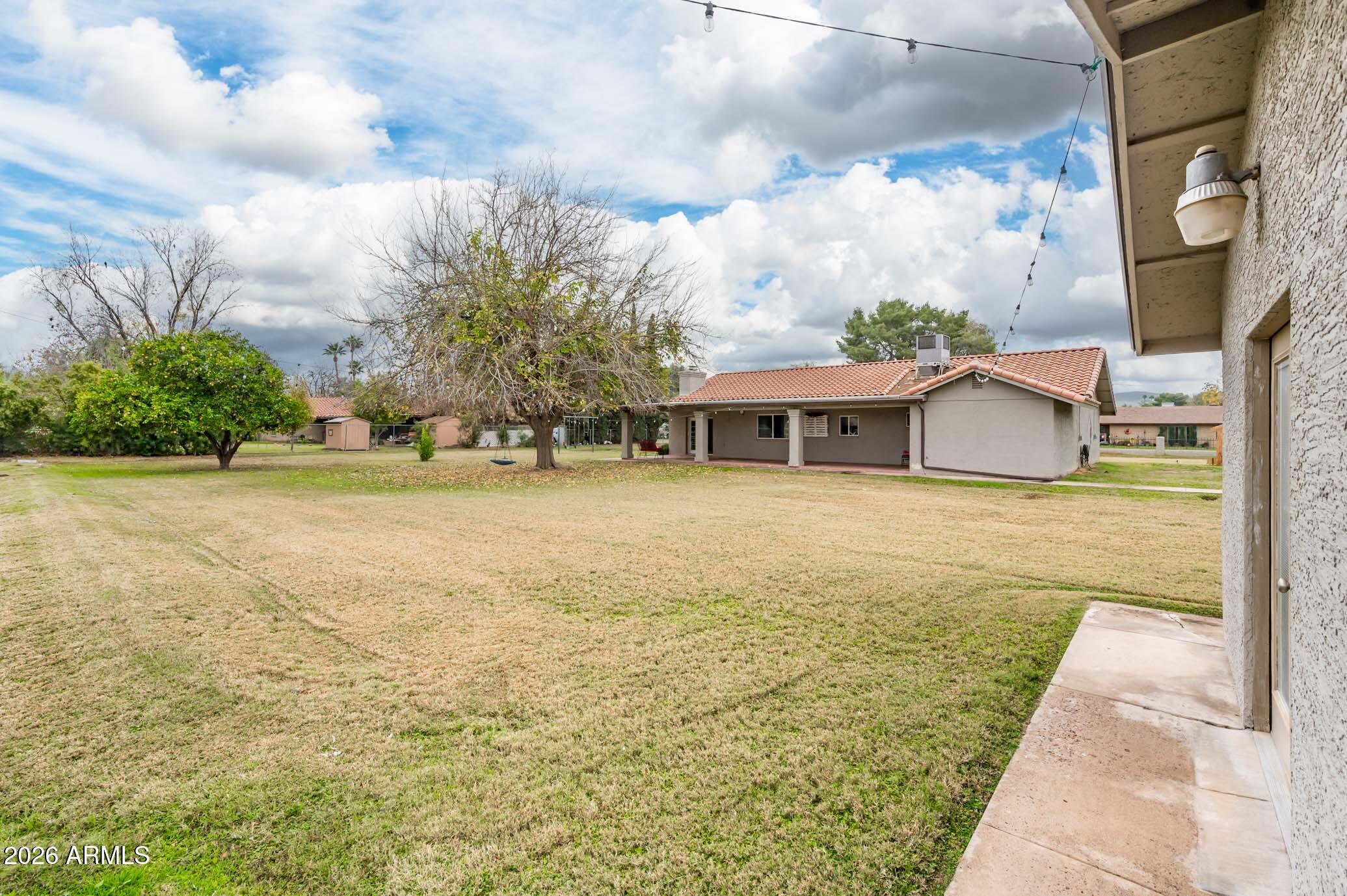 4730 West Piedmont Road Laveen, AZ 85339 - Photo 59 of 65 a view of house with garden space and sitting area