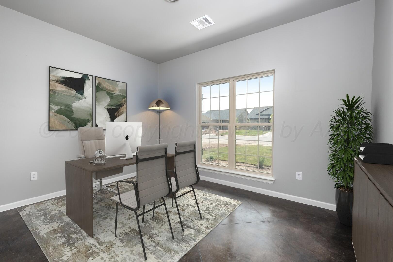 10307 Ruse Street Amarillo, TX 79118 - Photo 12 of 23 a workspace with furniture and a potted plant