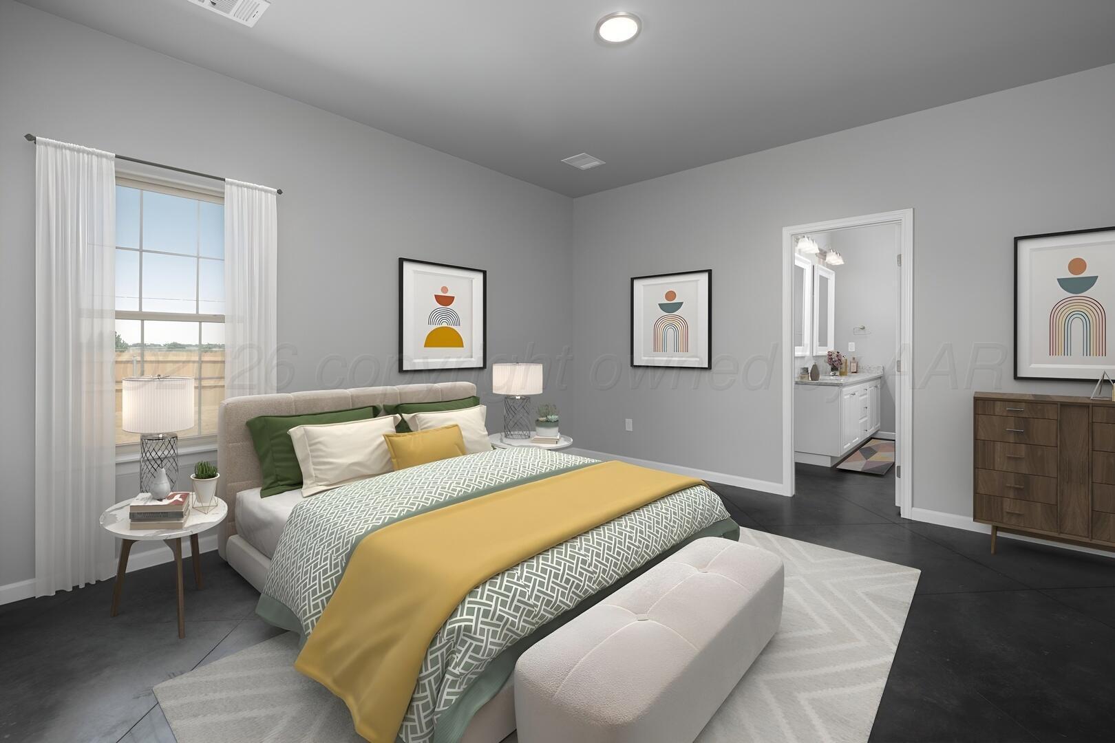 10307 Ruse Street Amarillo, TX 79118 - Photo 16 of 23 a bedroom with a large bed and a chandelier