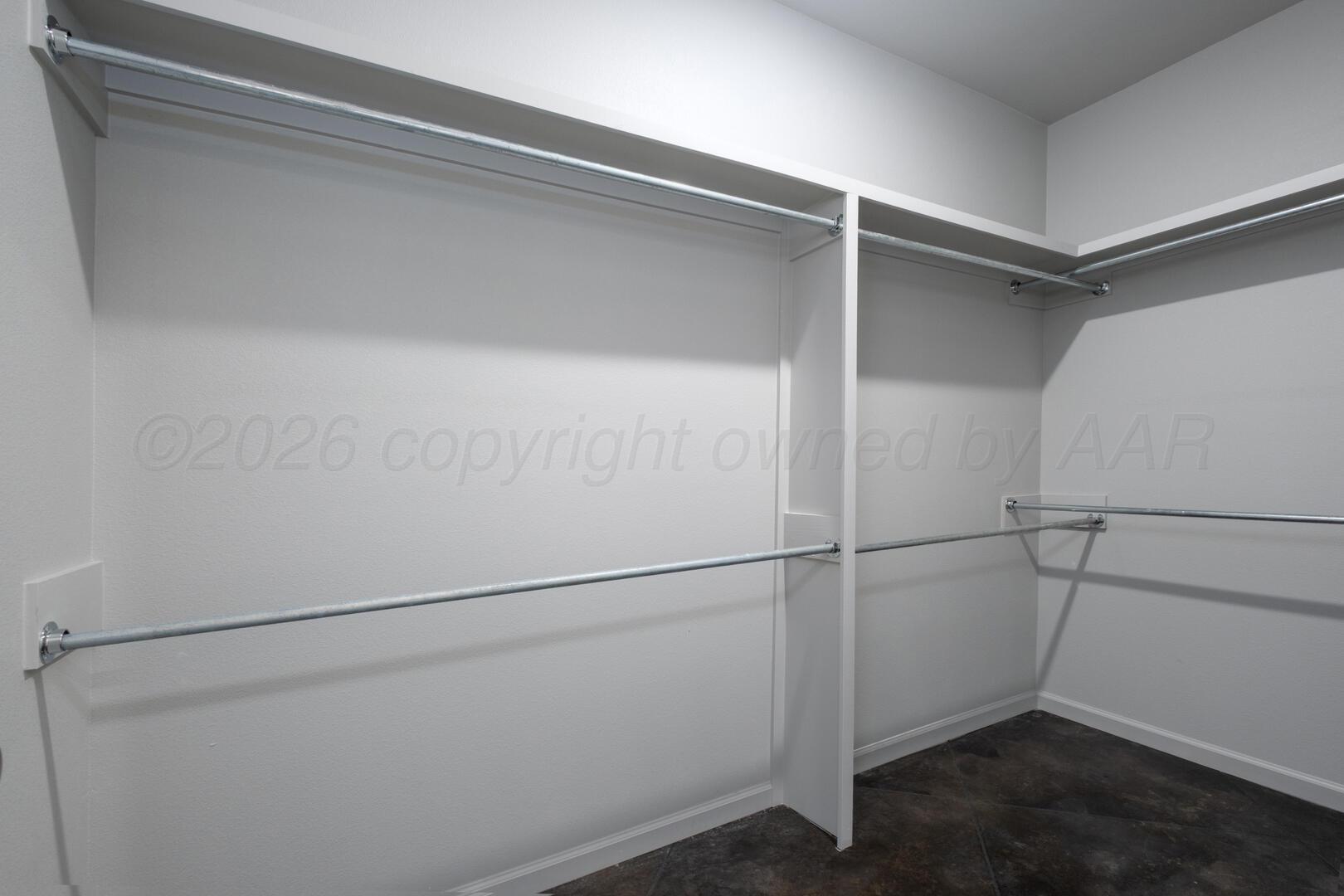 10307 Ruse Street Amarillo, TX 79118 - Photo 17 of 23 a view of an empty walk in closet