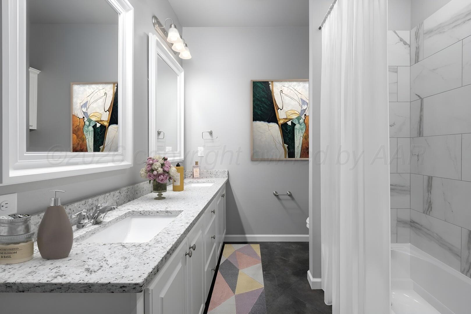 10307 Ruse Street Amarillo, TX 79118 - Photo 20 of 23 a bathroom with a granite countertop sink and a mirror