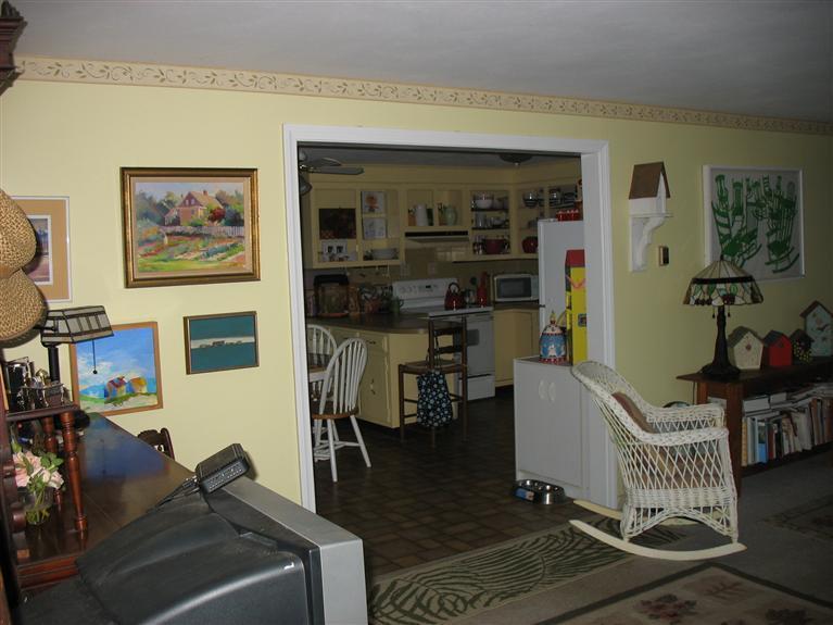 40 Deerfield Lane Eastham, MA 02642 - Photo 5 of 11 a living room with furniture and a window