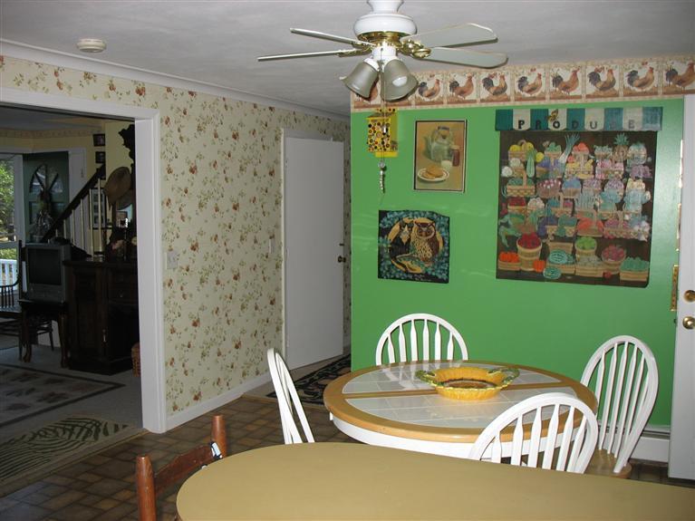 40 Deerfield Lane Eastham, MA 02642 - Photo 7 of 11 a view of a dining room with furniture window and wooden floor