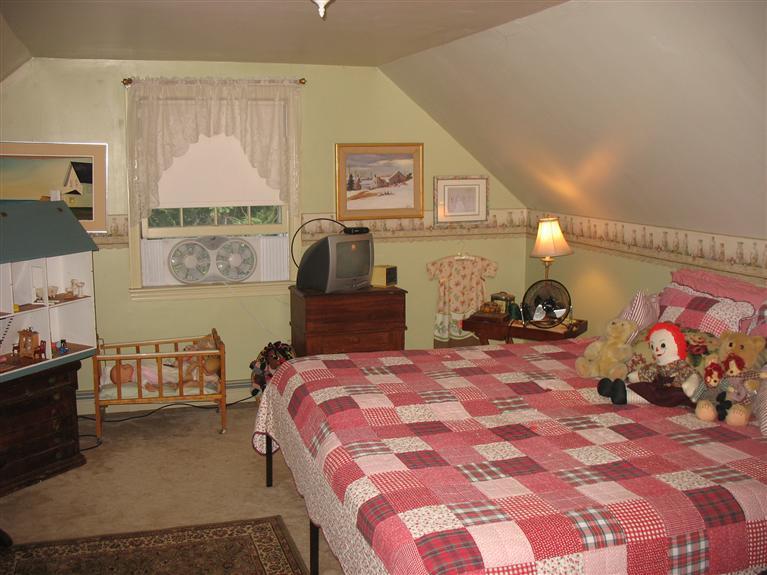 40 Deerfield Lane Eastham, MA 02642 - Photo 8 of 11 a bedroom with bed and window