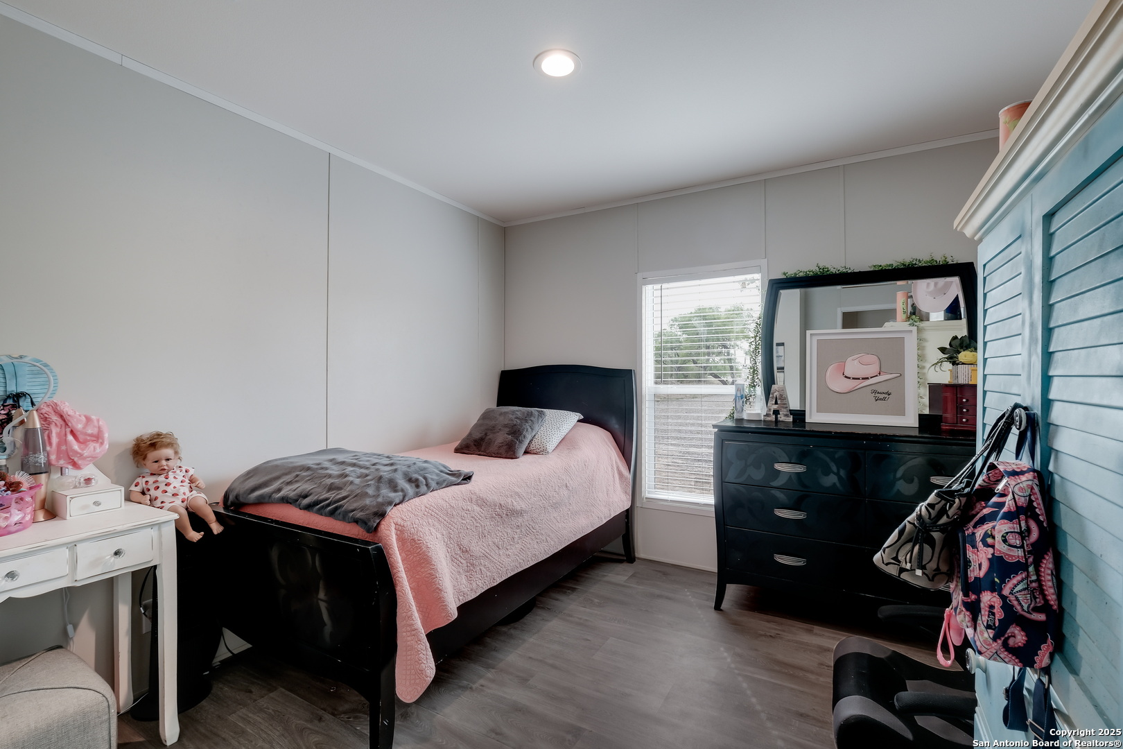 753 Pr Riley Lane Charlotte, TX 78011 - Photo 15 of 22 a bedroom with a bed and window