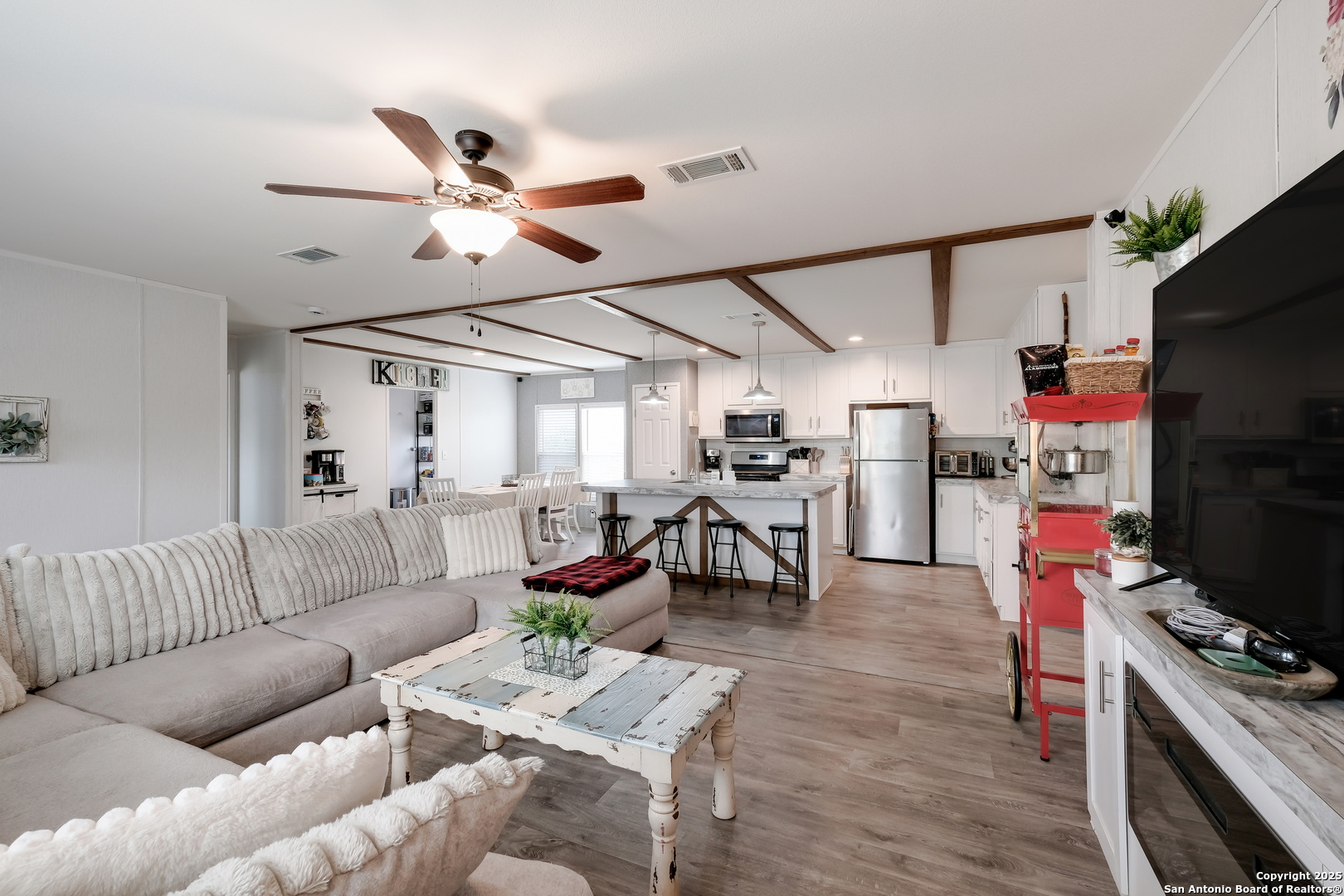 753 Pr Riley Lane Charlotte, TX 78011 - Photo 4 of 22 a living room with furniture and a flat screen tv