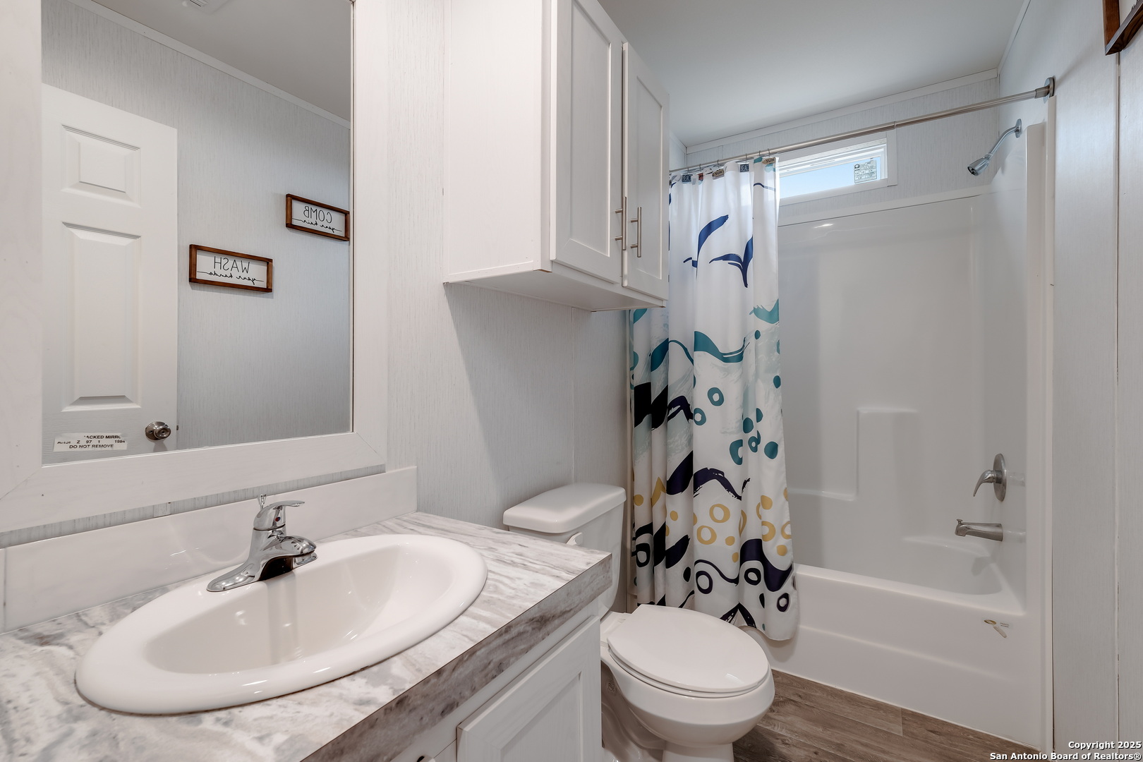 753 Pr Riley Lane Charlotte, TX 78011 - Photo 9 of 22 a bathroom with a sink toilet and shower