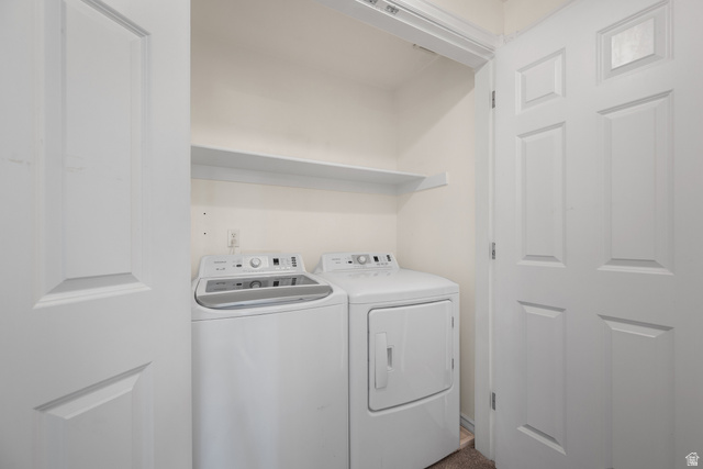 463 North 2400 West, Unit 7 Springville, UT 84663 - Photo 18 of 22 Dedicated laundry area with white appliances and built-in shelving
