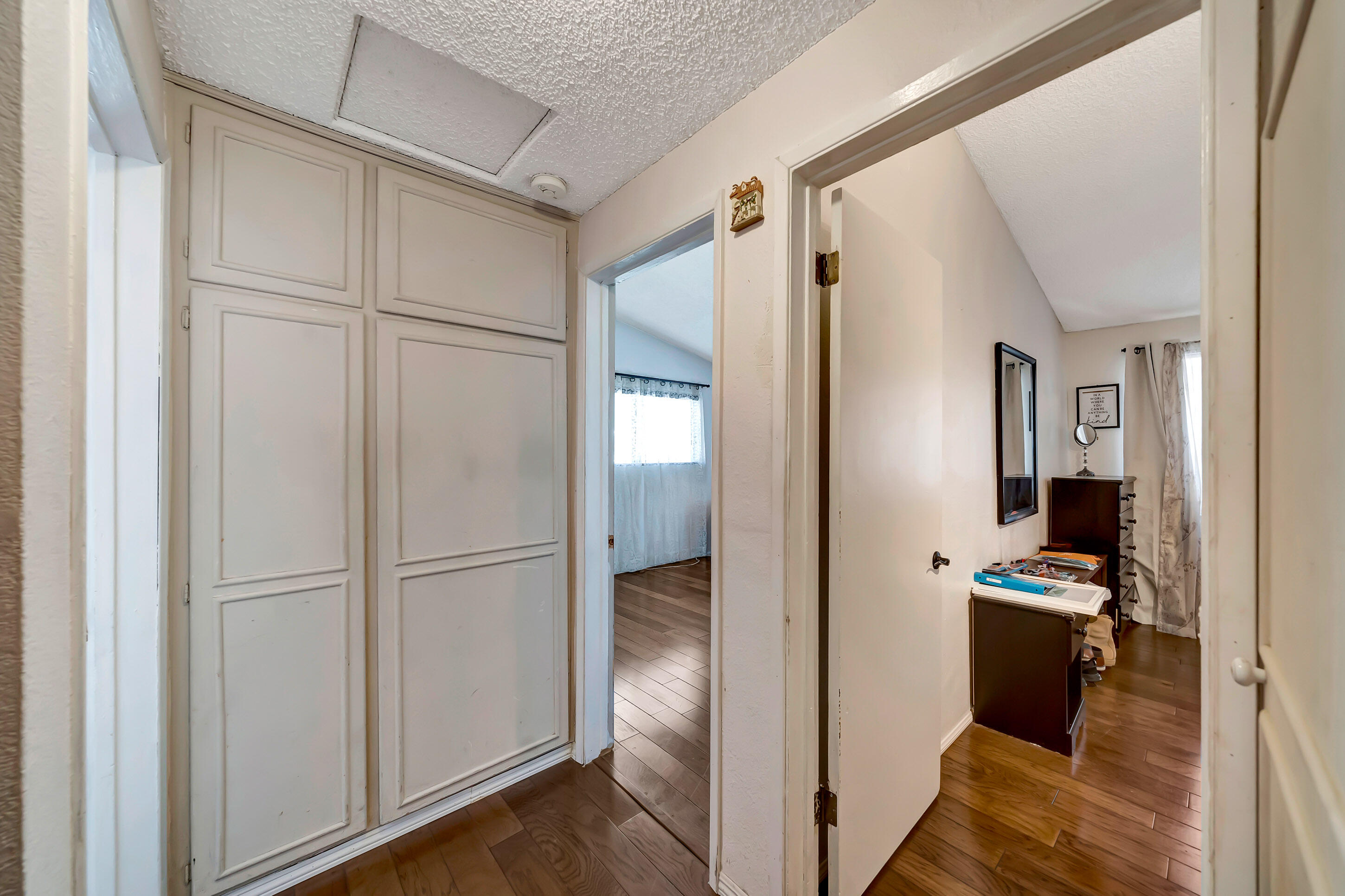 1617 Elizabeth Lake Road Palmdale, CA 93551 - Photo 20 of 45 a view of a refrigerator and an empty room
