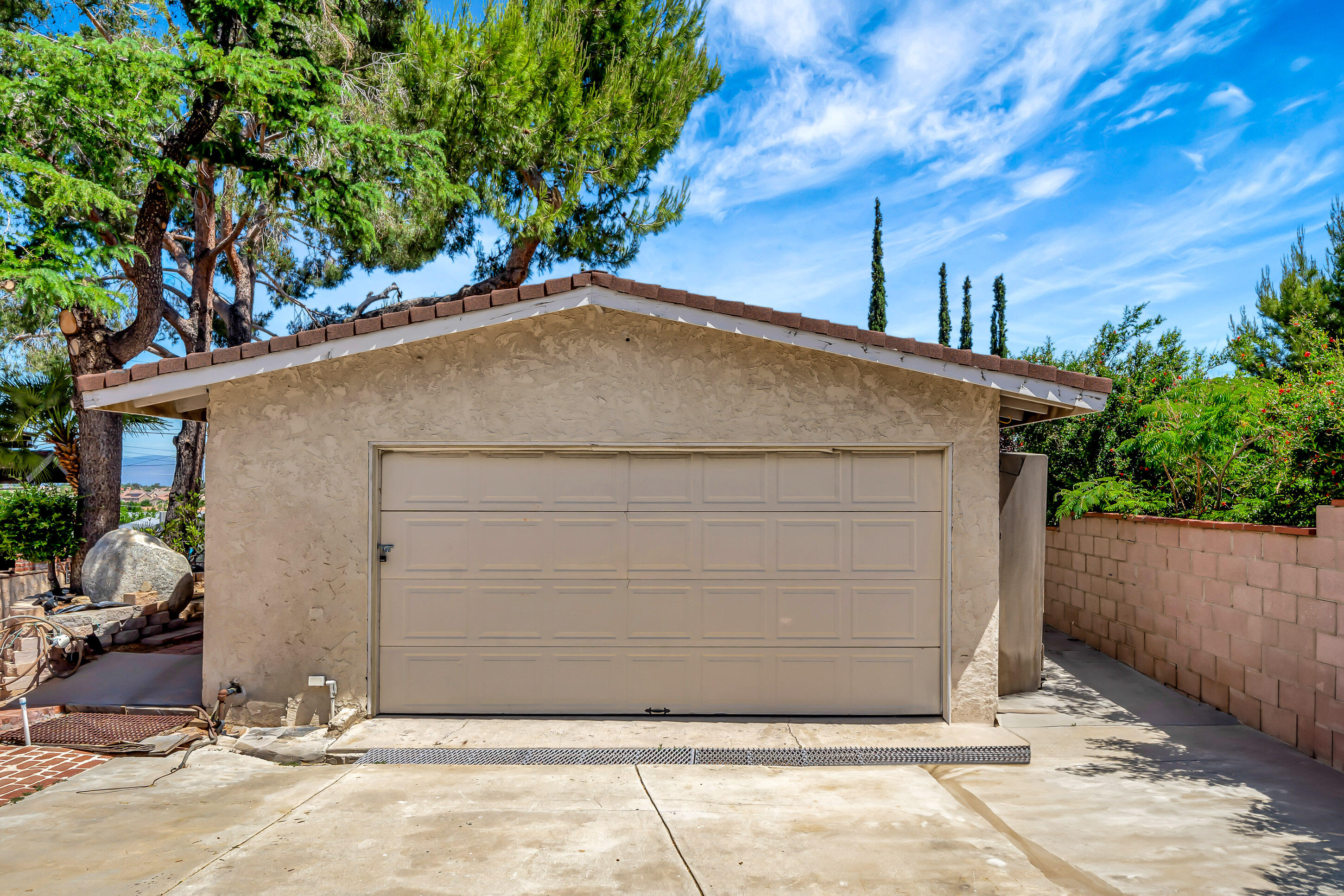 1617 Elizabeth Lake Road Palmdale, CA 93551 - Photo 35 of 45 a house with a tree