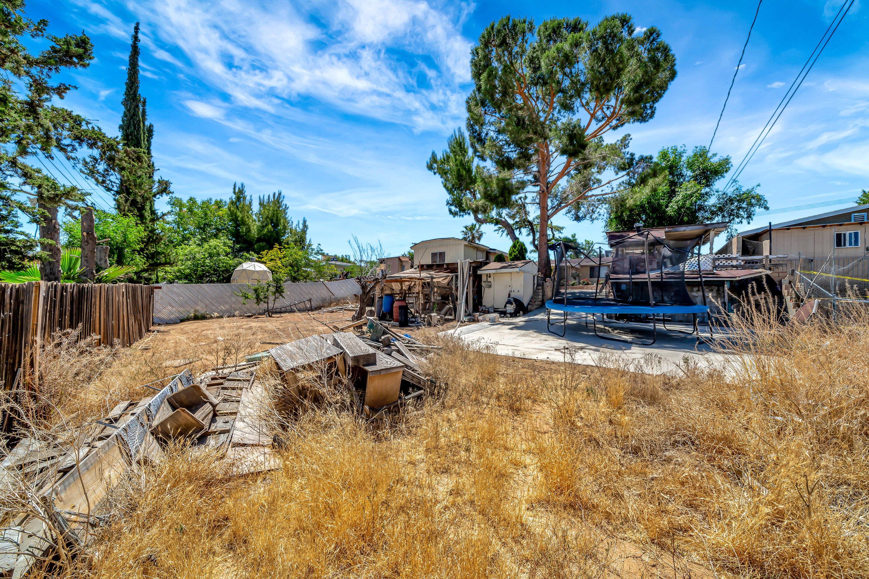 1617 Elizabeth Lake Road Palmdale, CA 93551 - Photo 38 of 45 a view of a backyard with sitting area
