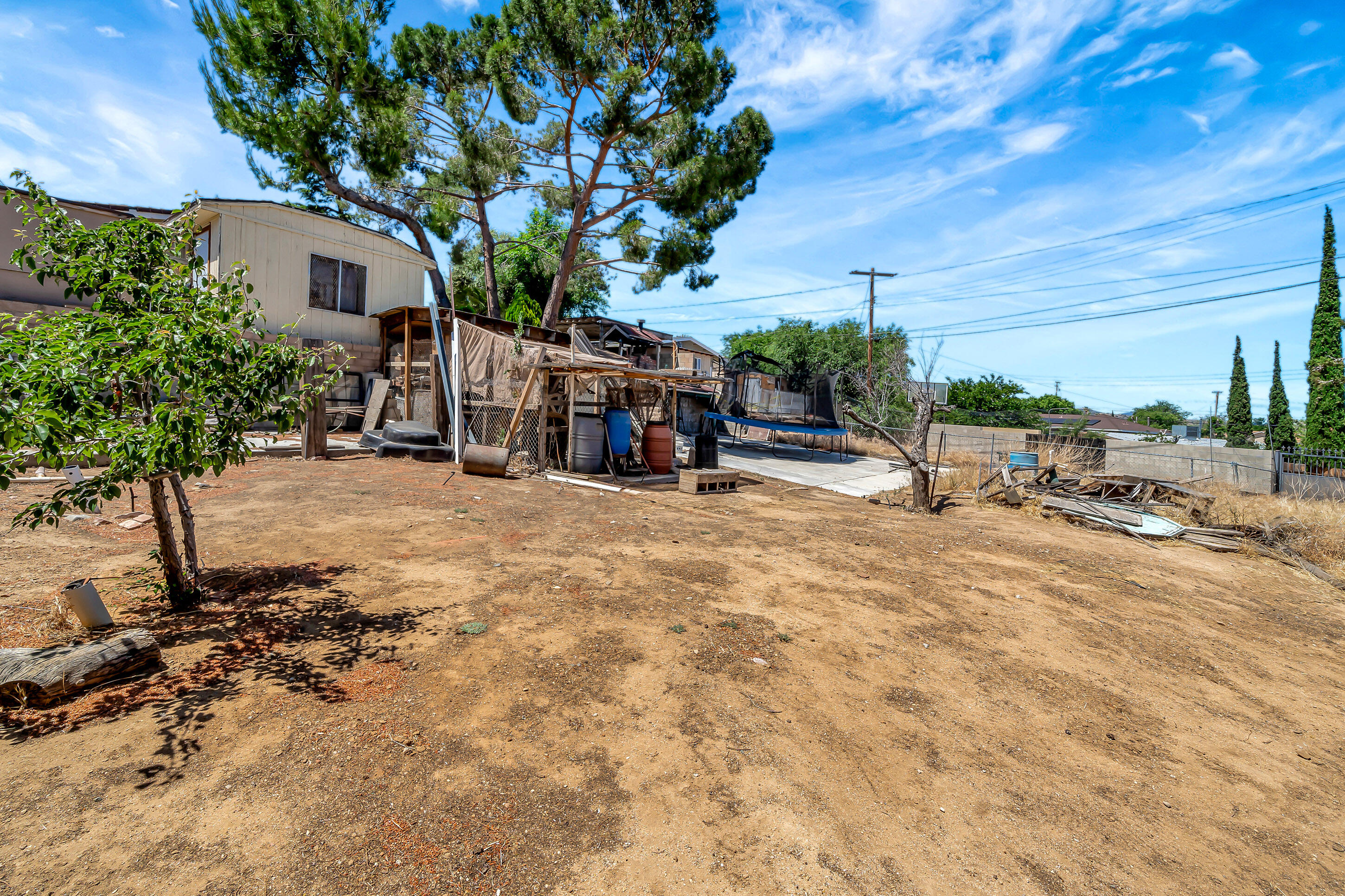 1617 Elizabeth Lake Road Palmdale, CA 93551 - Photo 39 of 45 a view of a chairs with a tree in front of it