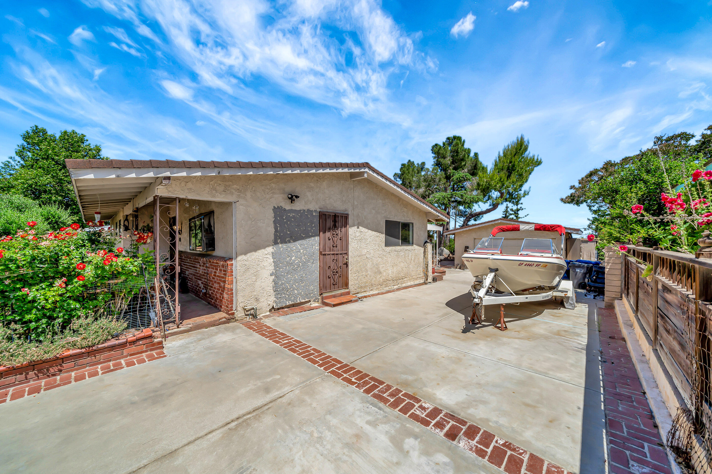 1617 Elizabeth Lake Road Palmdale, CA 93551 - Photo 43 of 45 a house view with a garden space