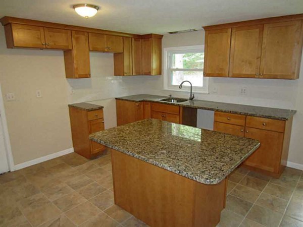 3147 Flat River Road Coventry, RI 02816 - Photo 10 of 24 a kitchen with granite countertop sink and cabinets