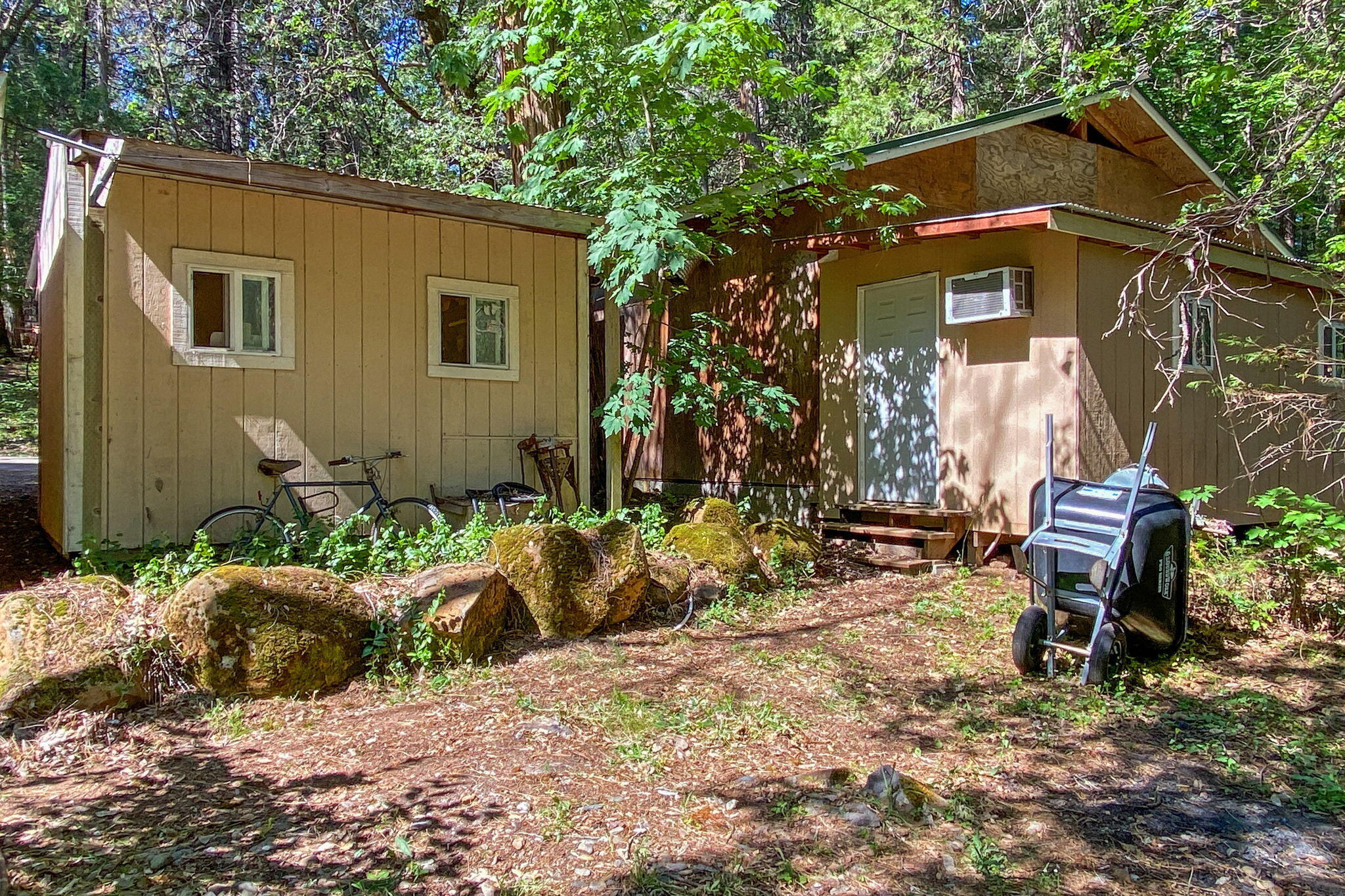 30303 Oak Run To Fern Road Whitmore, CA 96096 - Photo 49 of 75 a backyard of a house with outdoor seating