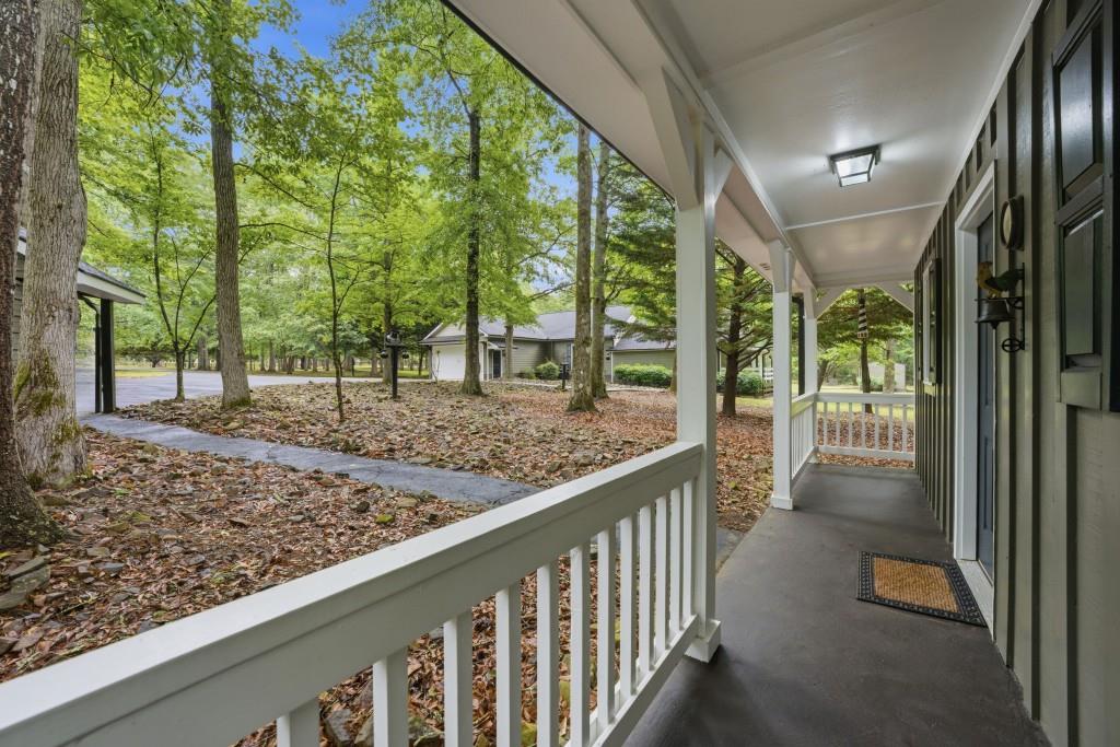 542 Knox Chapel Road Social Circle, GA 30025 - Photo 26 of 52 a view of a porch with a backyard