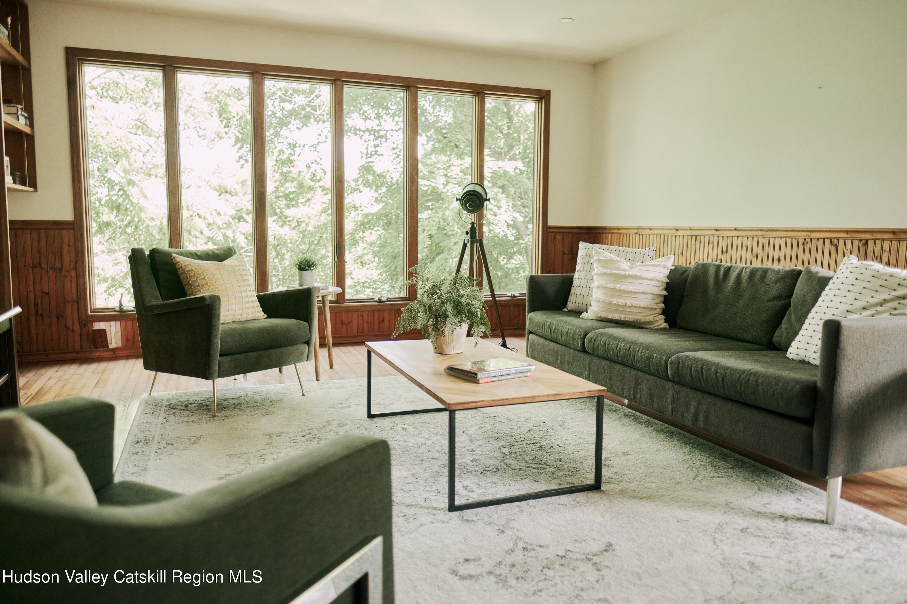 284 Dewitt Mills Road Kingston, NY 12401 - Photo 13 of 36 a living room with furniture and floor to ceiling windows