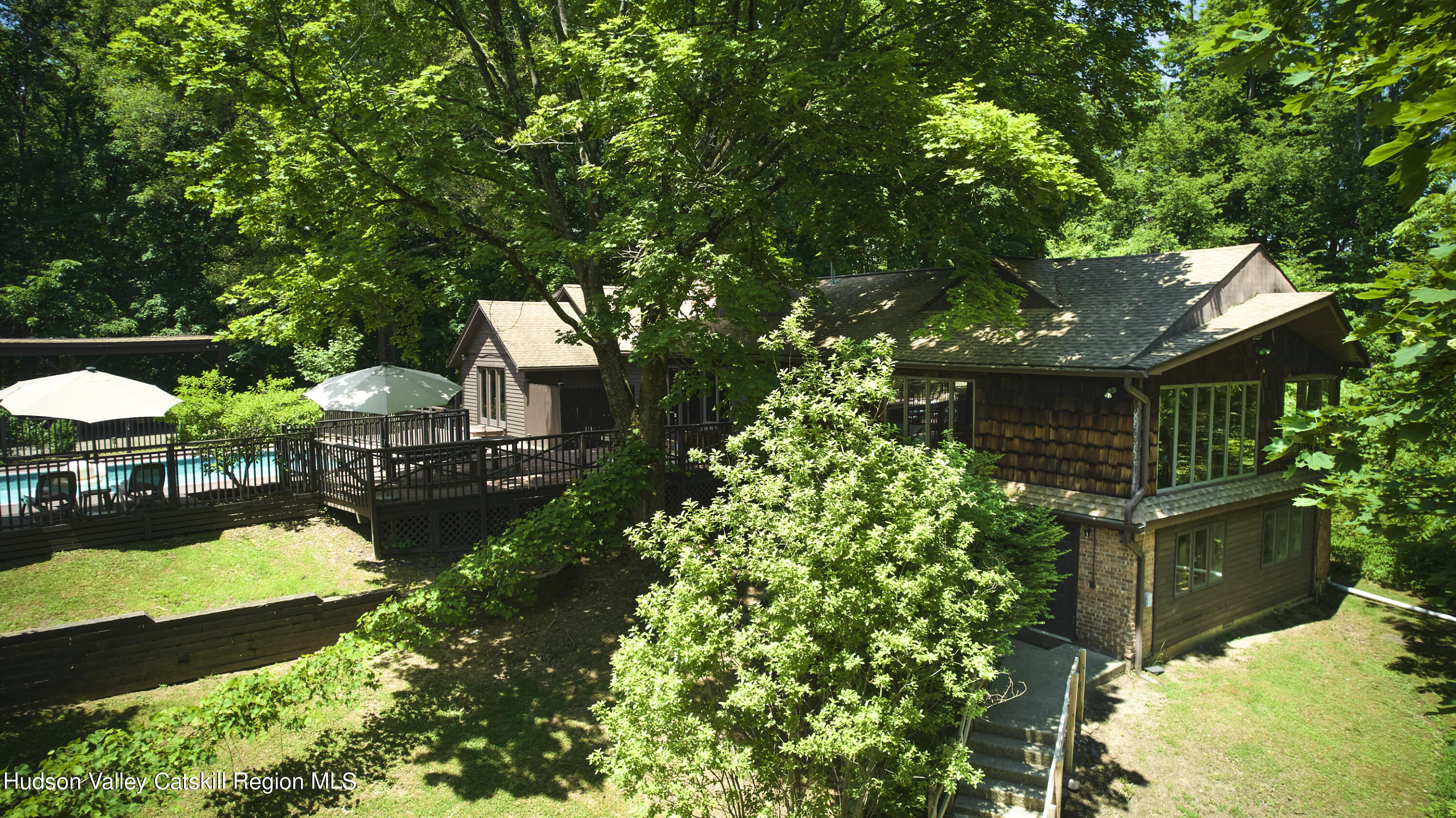 284 Dewitt Mills Road Kingston, NY 12401 - Photo 2 of 36 a backyard of a house with lots of green space and fountain