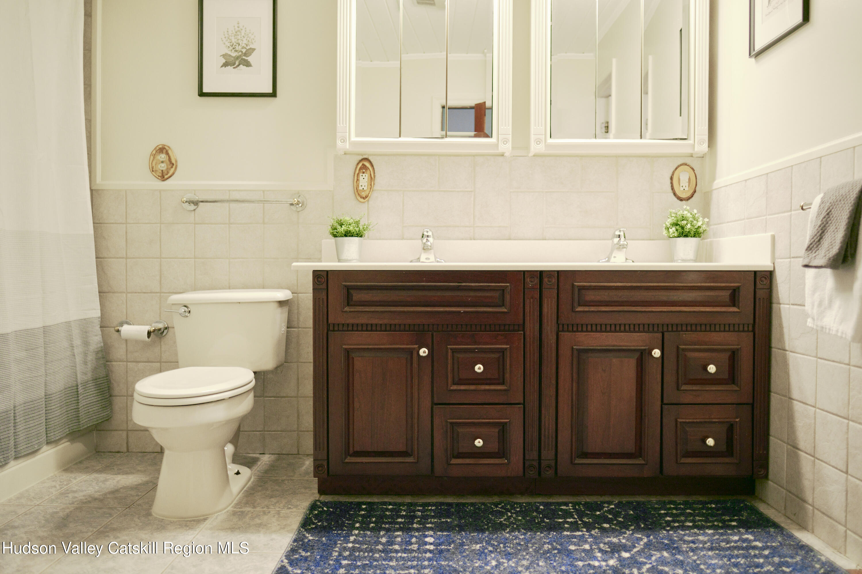 284 Dewitt Mills Road Kingston, NY 12401 - Photo 21 of 36 a bathroom with a sink toilet and mirror
