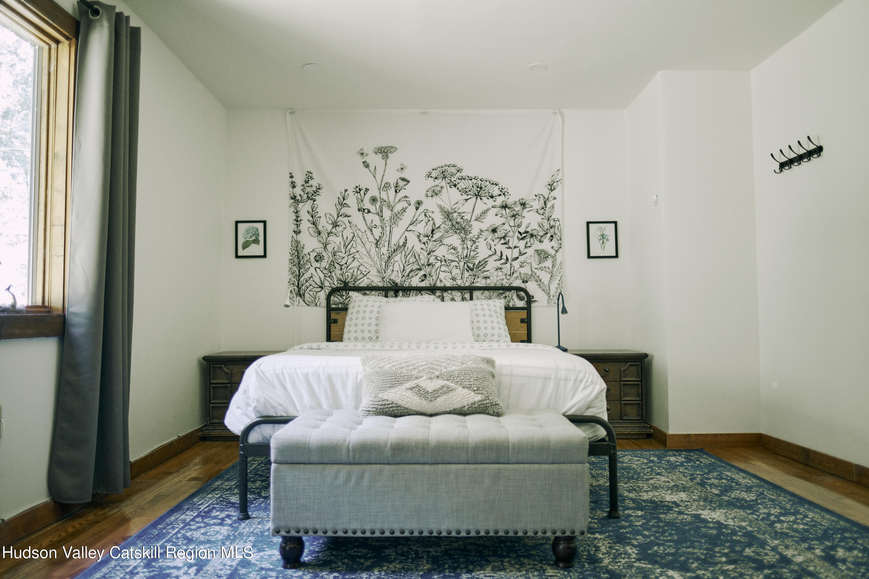 284 Dewitt Mills Road Kingston, NY 12401 - Photo 24 of 36 a bedroom with a bed and a window