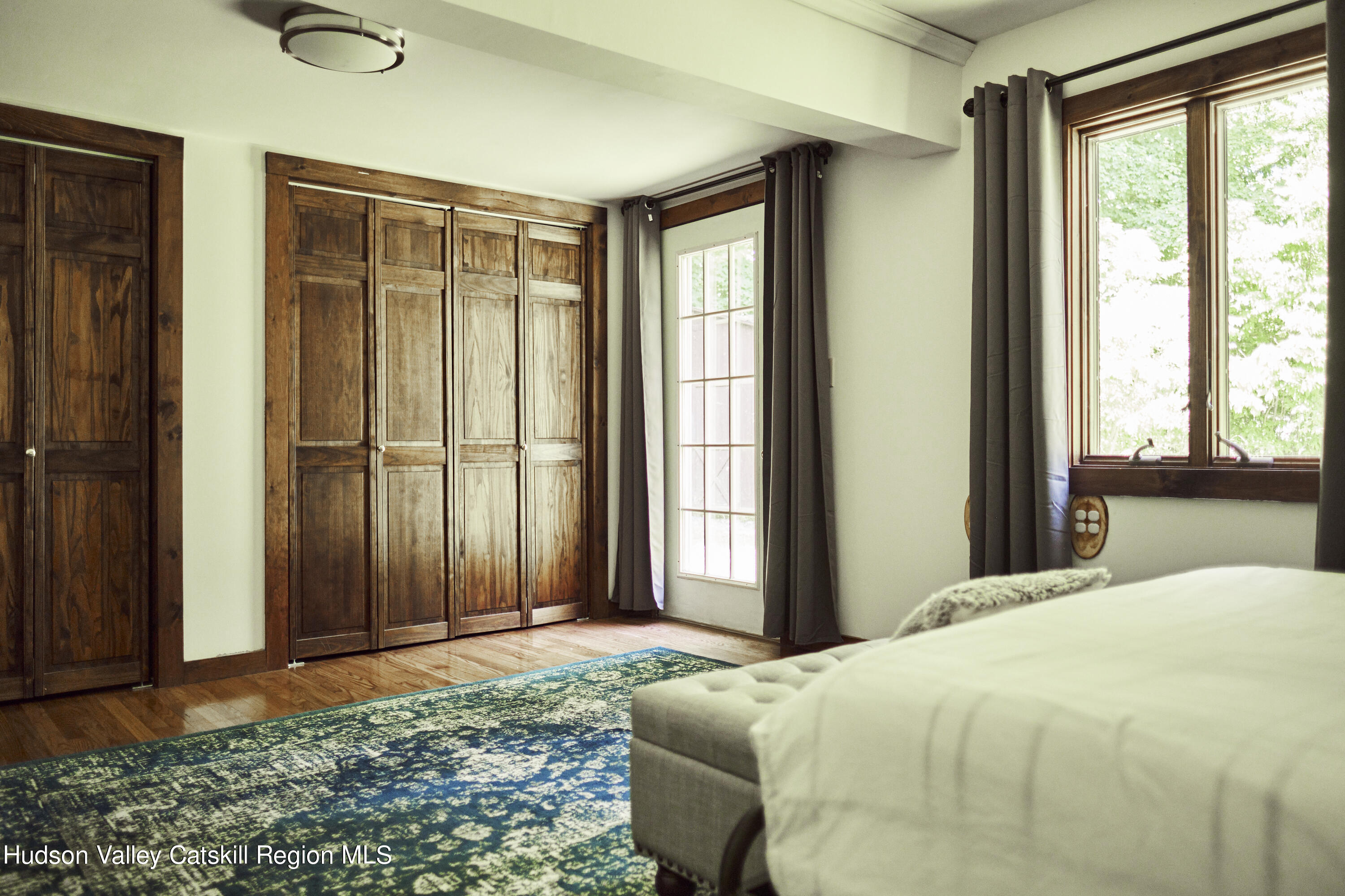 284 Dewitt Mills Road Kingston, NY 12401 - Photo 25 of 36 a bedroom with a bed and a window