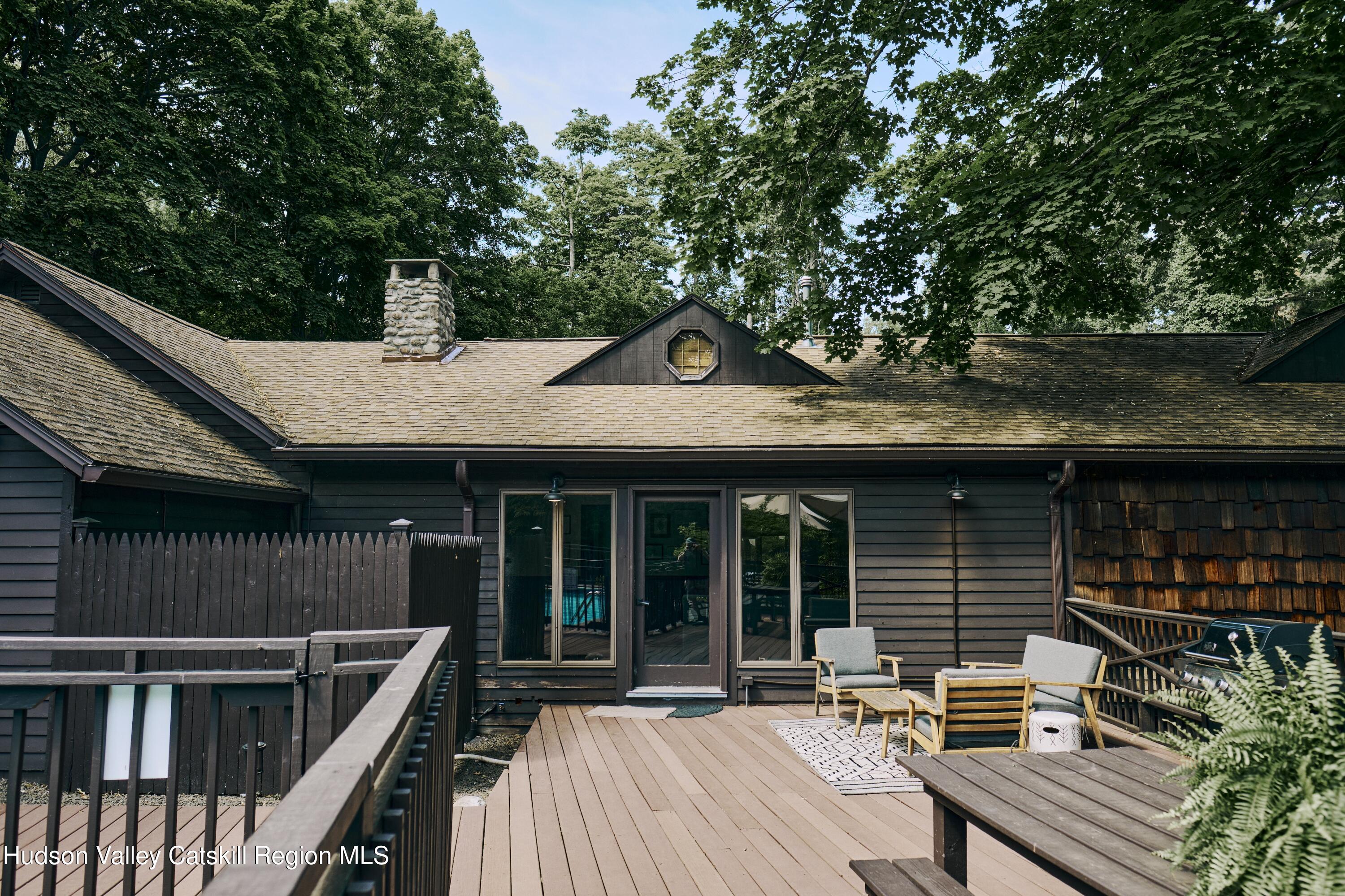 284 Dewitt Mills Road Kingston, NY 12401 - Photo 34 of 36 a backyard of a house with seating space