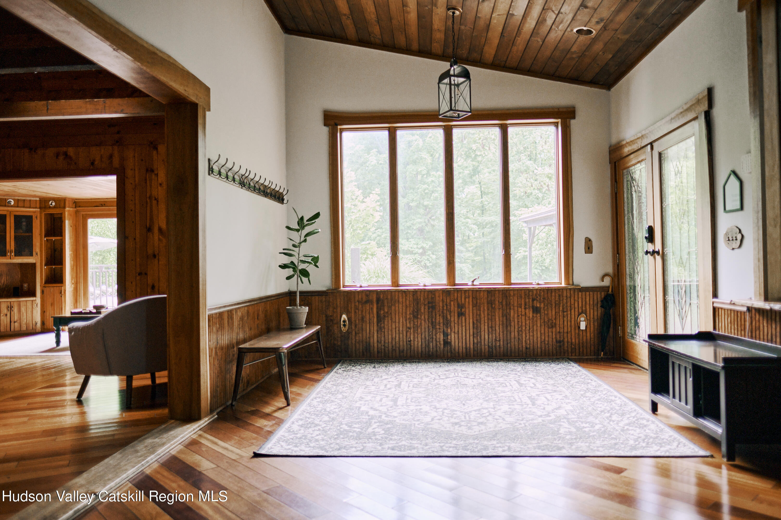 284 Dewitt Mills Road Kingston, NY 12401 - Photo 4 of 36 a living room with a couch and a table