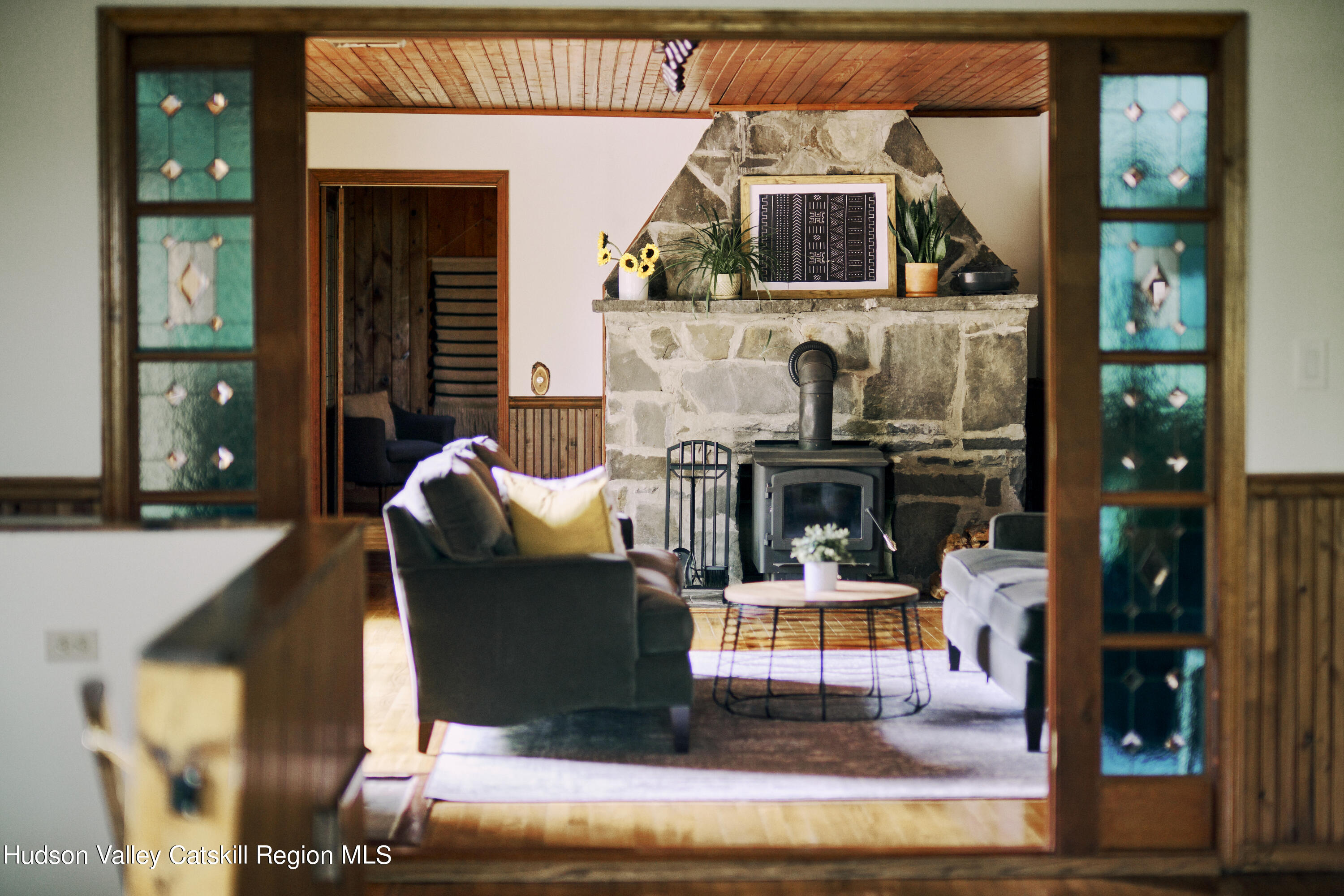 284 Dewitt Mills Road Kingston, NY 12401 - Photo 9 of 36 a living room with furniture and a fireplace