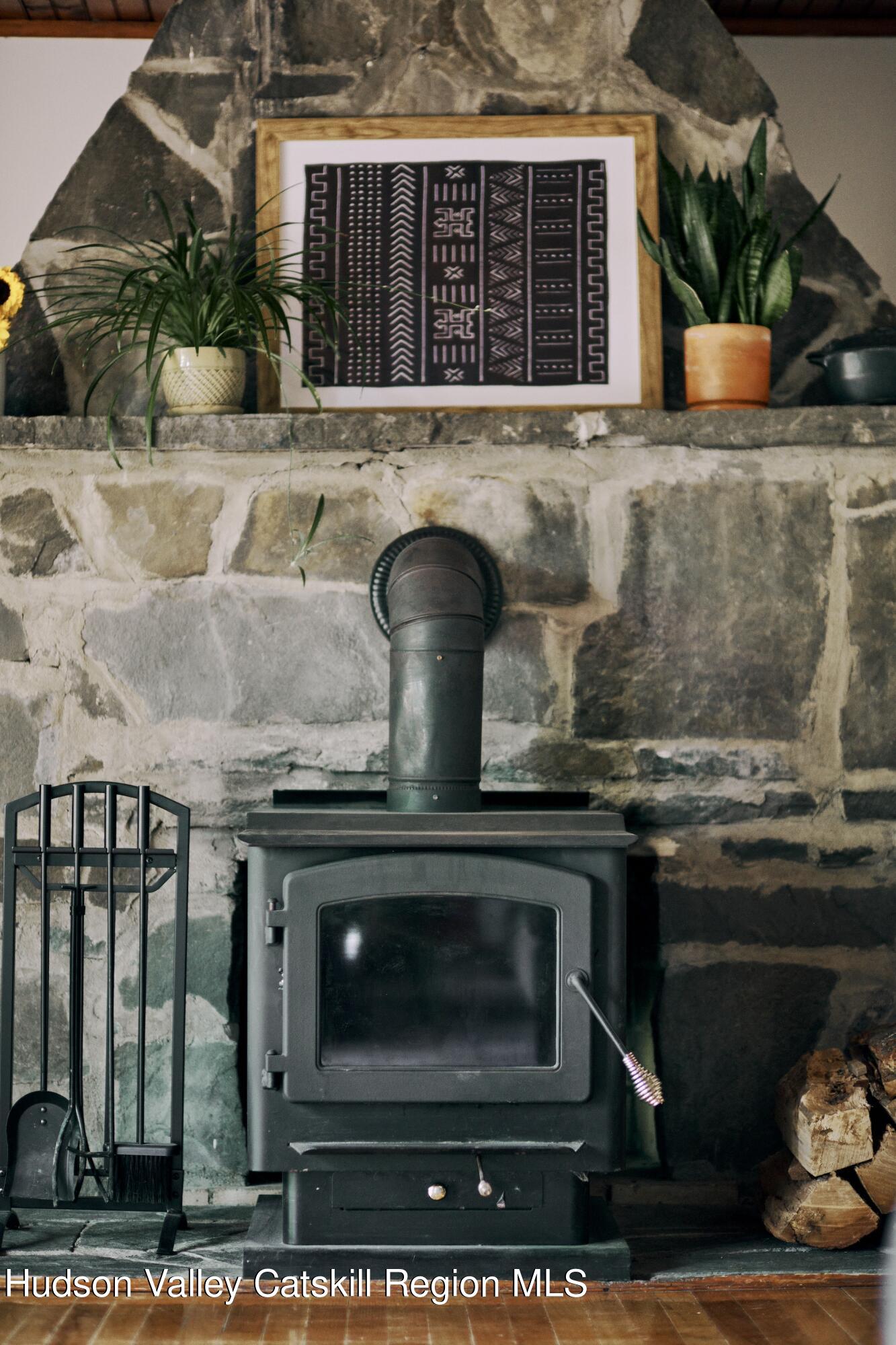 284 Dewitt Mills Road Kingston, NY 12401 - Photo 10 of 36 a view of fireplace and wooden floor