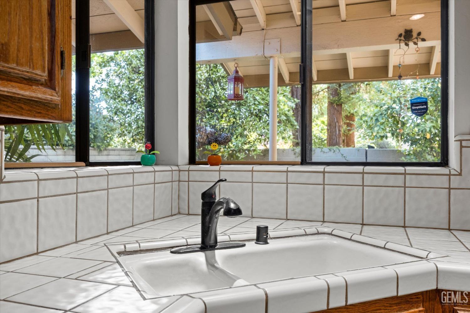 Undisclosed Address Bakersfield, CA 93309 - Photo 15 of 36 a room with a bed and a large window