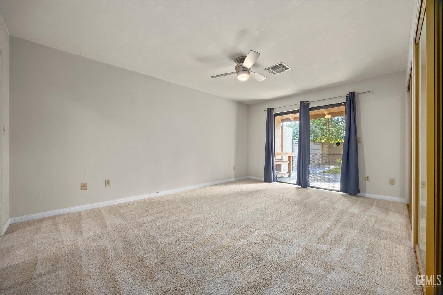 Undisclosed Address Bakersfield, CA 93309 - Photo 17 of 36 a view of an empty room with a window