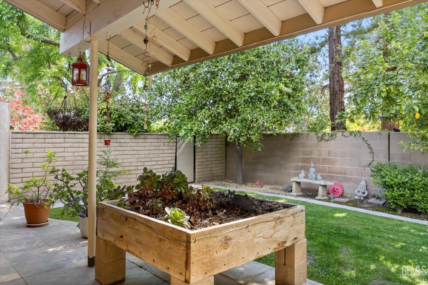 Undisclosed Address Bakersfield, CA 93309 - Photo 29 of 36 a view of a backyard with plants