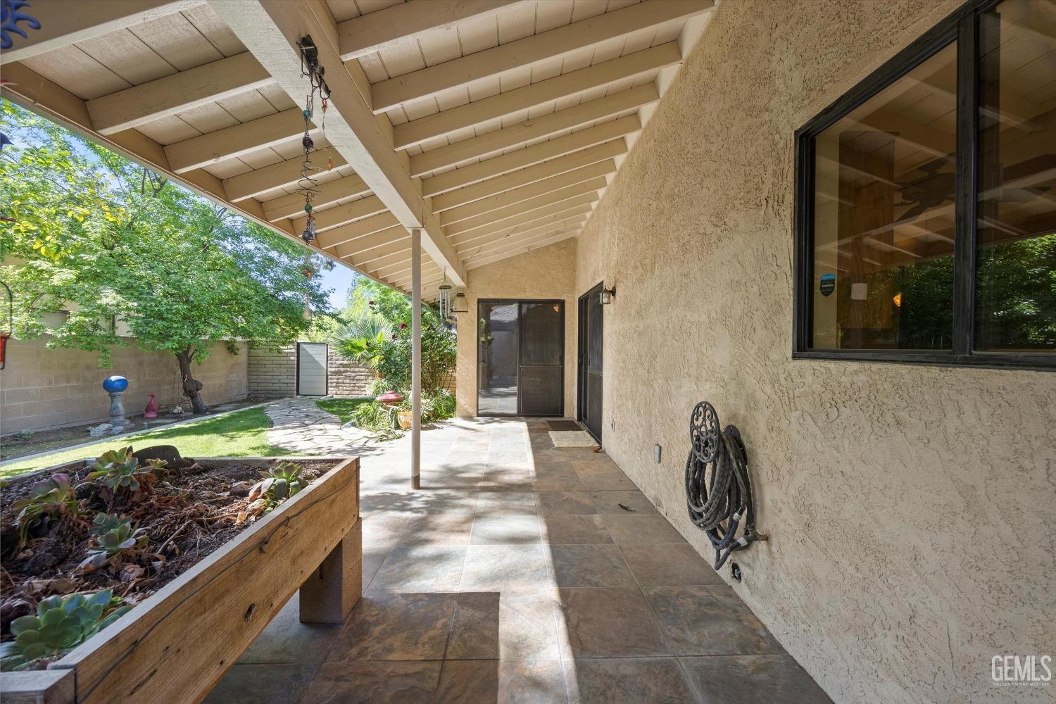Undisclosed Address Bakersfield, CA 93309 - Photo 31 of 36 a view of a porch with furniture and a yard