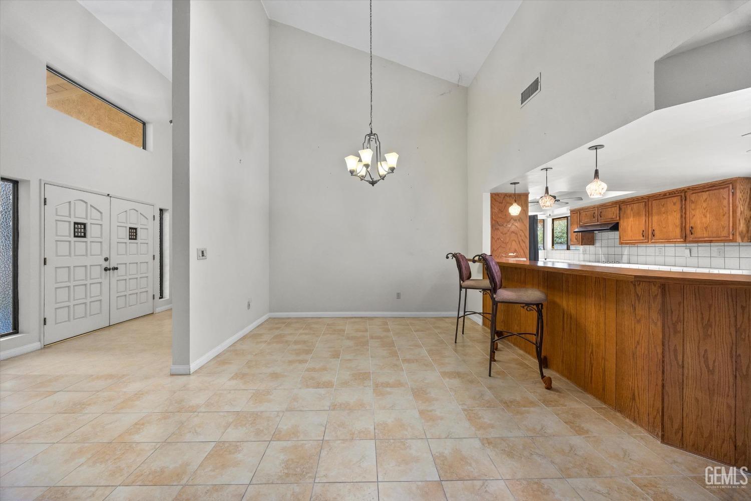Undisclosed Address Bakersfield, CA 93309 - Photo 7 of 36 a view of a hallway with seating area