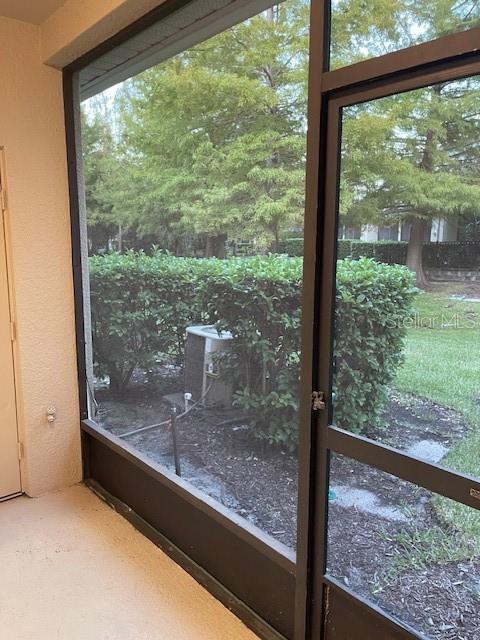 803 Shropshire Loop Sanford, FL 32771 - Photo 11 of 29 a view of a room with a large window and an outdoor view