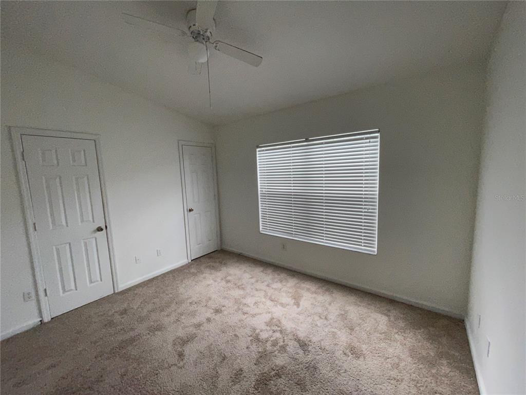 803 Shropshire Loop Sanford, FL 32771 - Photo 22 of 29 a view of an empty room with a window