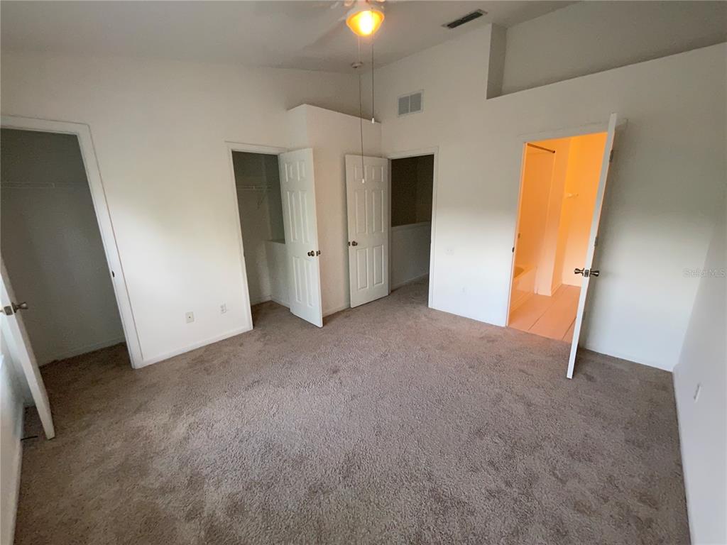 803 Shropshire Loop Sanford, FL 32771 - Photo 25 of 29 a view of a room with furniture and a window