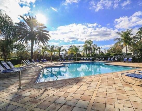 803 Shropshire Loop Sanford, FL 32771 - Photo 28 of 29 a view of swimming pool with lounge chair