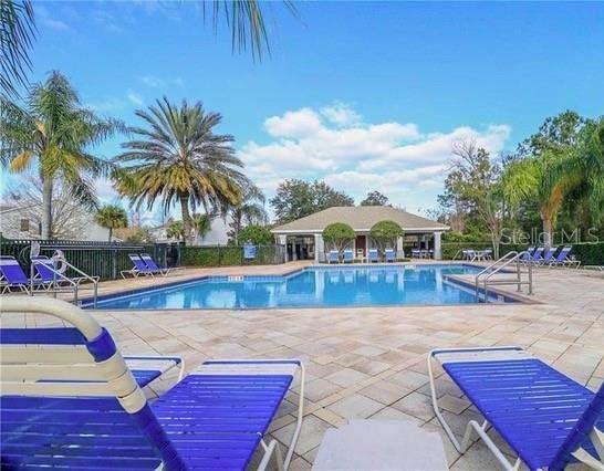 803 Shropshire Loop Sanford, FL 32771 - Photo 29 of 29 a view of a swimming pool with lounge chairs