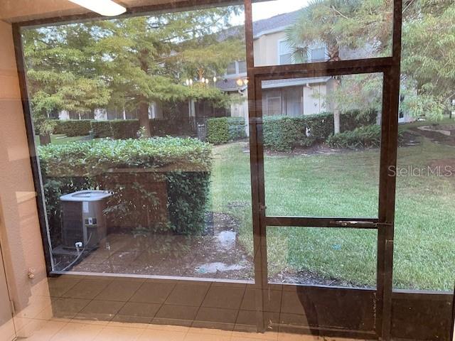 803 Shropshire Loop Sanford, FL 32771 - Photo 10 of 29 a view of a back yard from a window