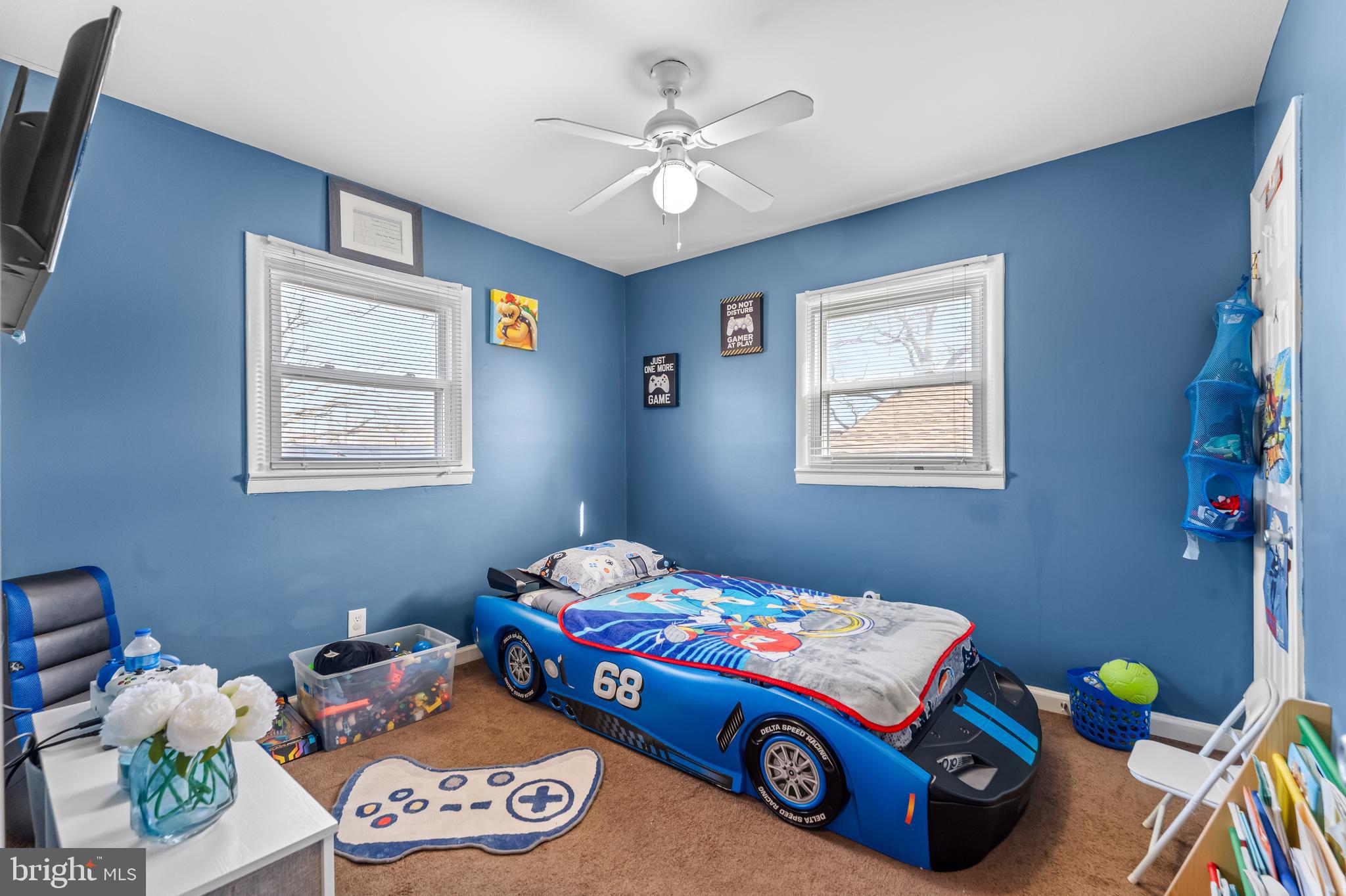 939 Clovis Avenue Capitol Heights, MD 20743 - Photo 14 of 25 a bedroom with bed and a window