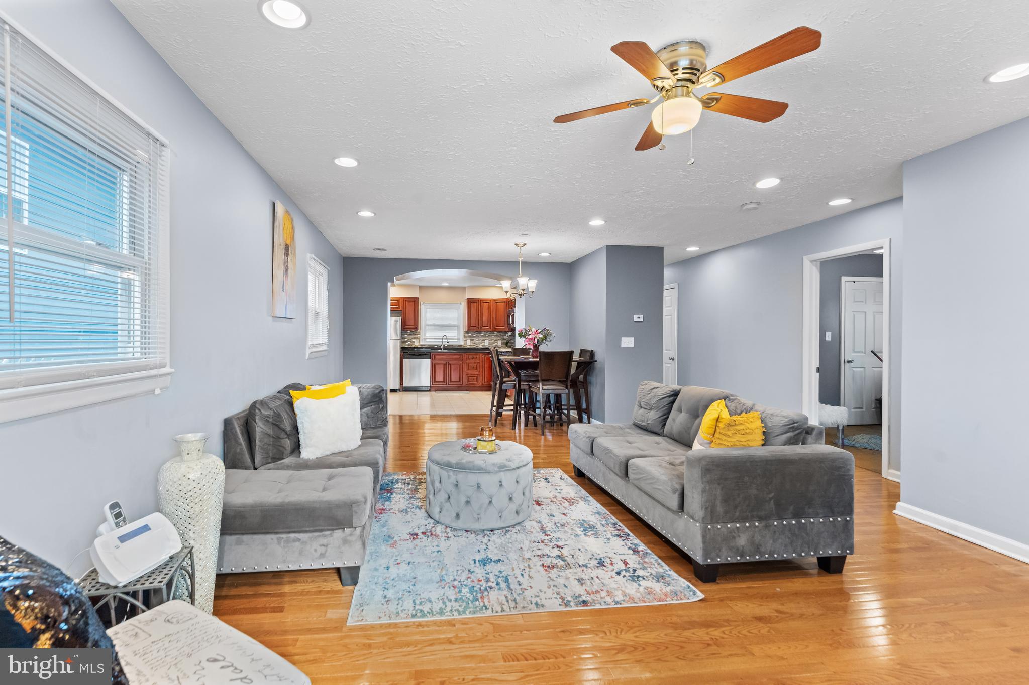 939 Clovis Avenue Capitol Heights, MD 20743 - Photo 2 of 25 a living room with furniture and wooden floor