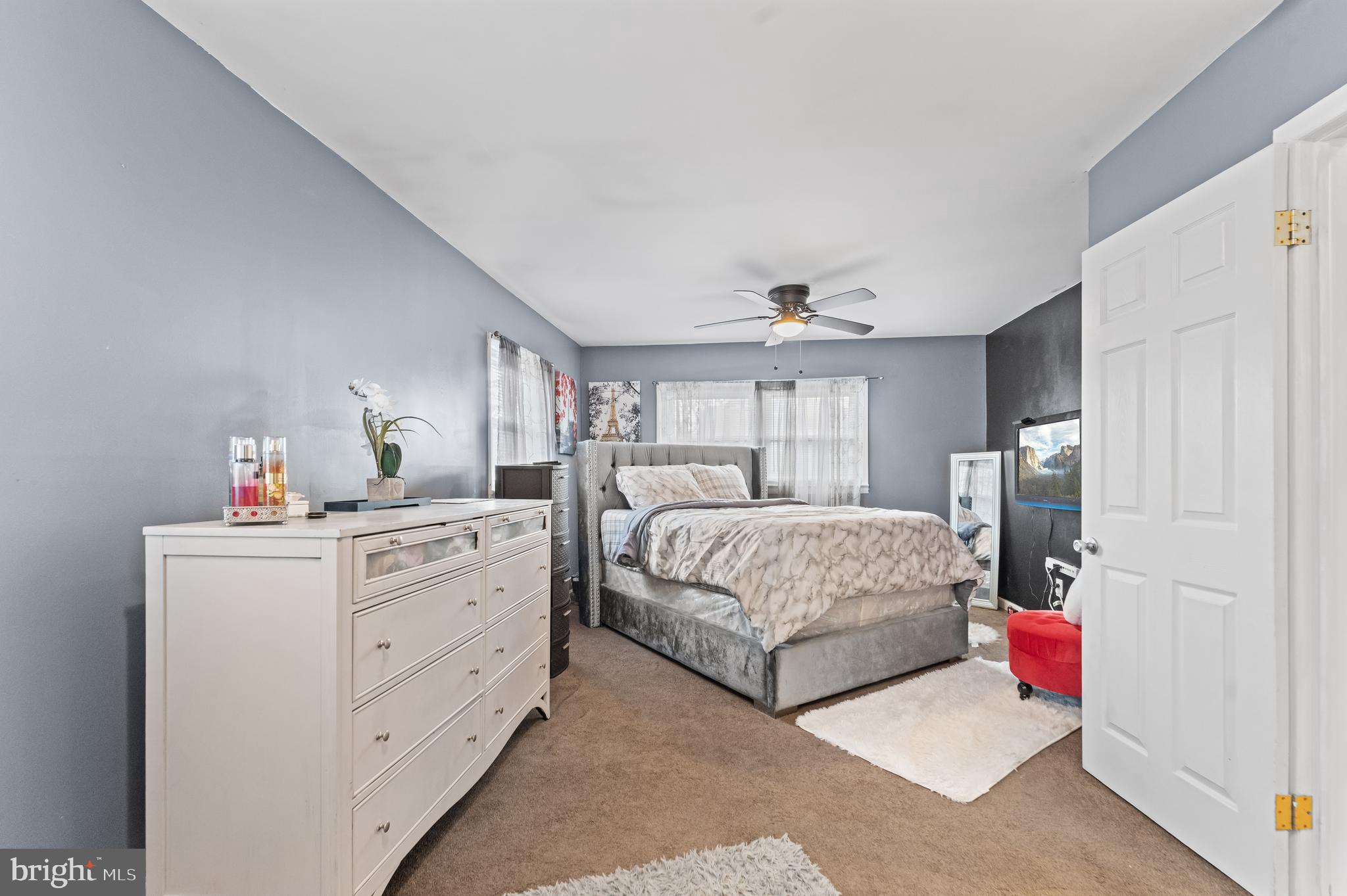 939 Clovis Avenue Capitol Heights, MD 20743 - Photo 9 of 25 a room with a bed and a dresser