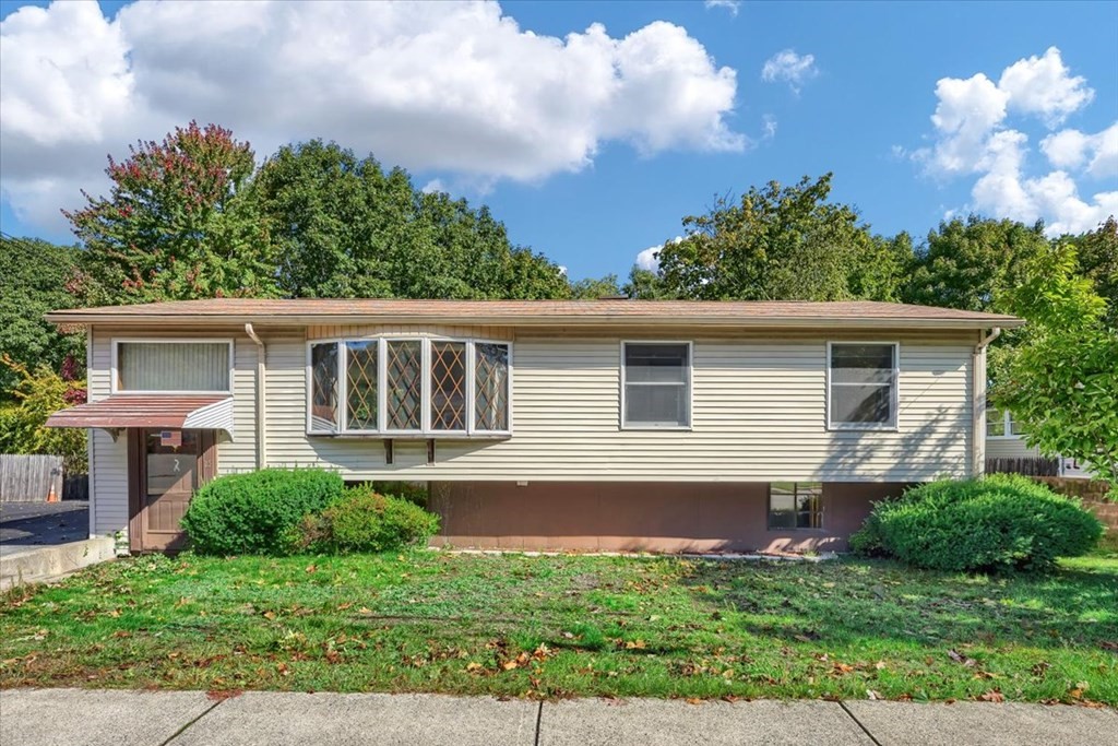 front view of house with a yard