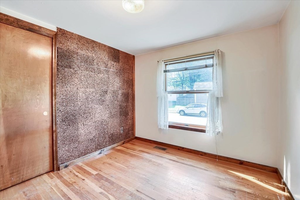15 Joan Road Boston, MA 02136 - Photo 14 of 37 an empty room with windows and closet